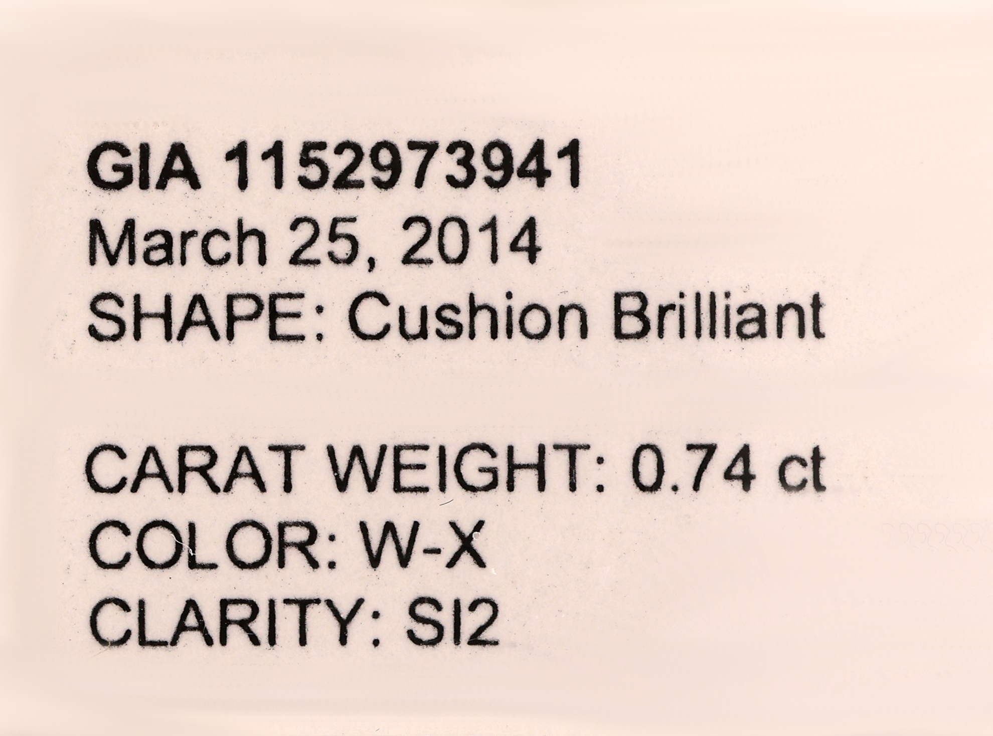 Detail a: Loser Diamant, 0.74 ct Light Yellow (W-X)/si2,Kissenschliff, verschweißt, GIA-Expertise