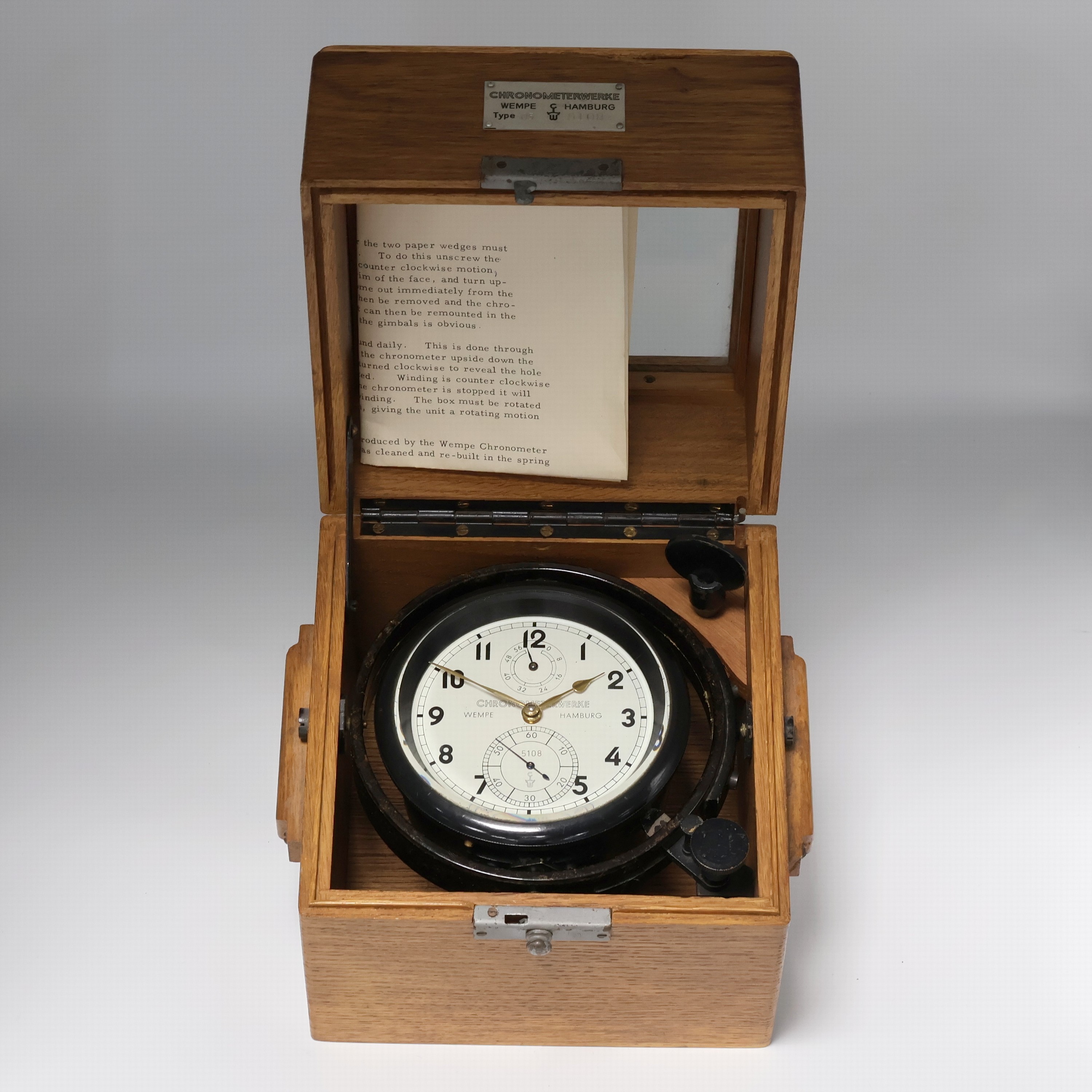 Image 27041690 - WEMPE Marinechronometer im Bakelit-Gehäuse in original Box, Deutschland um 1946, 2-tlg. ...