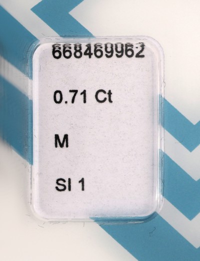 27041614a - Loser Princess Cut Diamant, 0.71 ct Getönt (M)/si1, eingeschweißt, IGI-Expertise