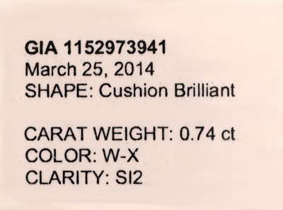 27041633a - Loser Diamant, 0.74 ct Light Yellow (W-X)/si2,Kissenschliff, verschweißt, GIA-Expertise