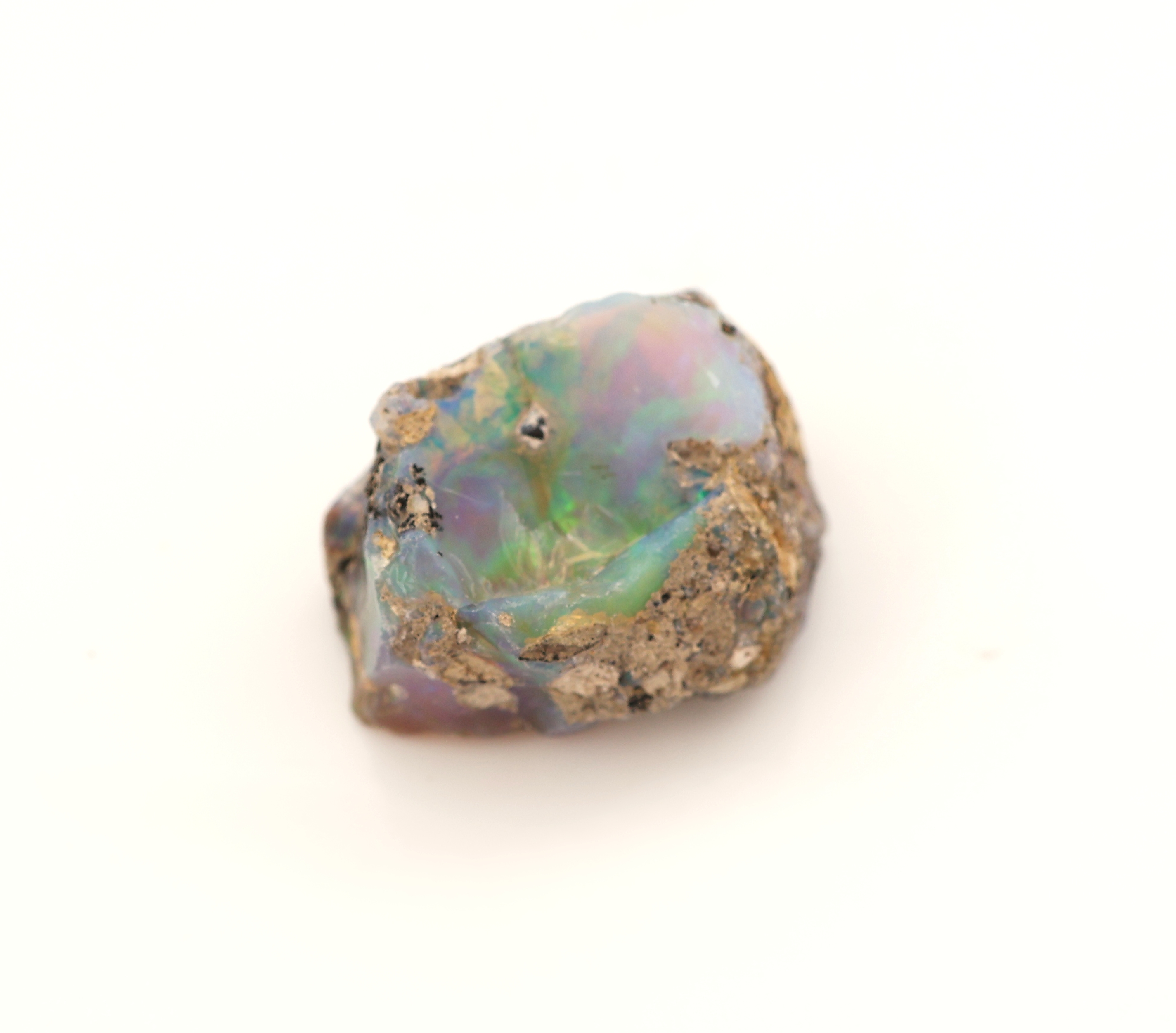 Image 27042086 - Loose rough opal , approx. 19.20 ct, nice play of colours with bedrock Valuation Price: ...