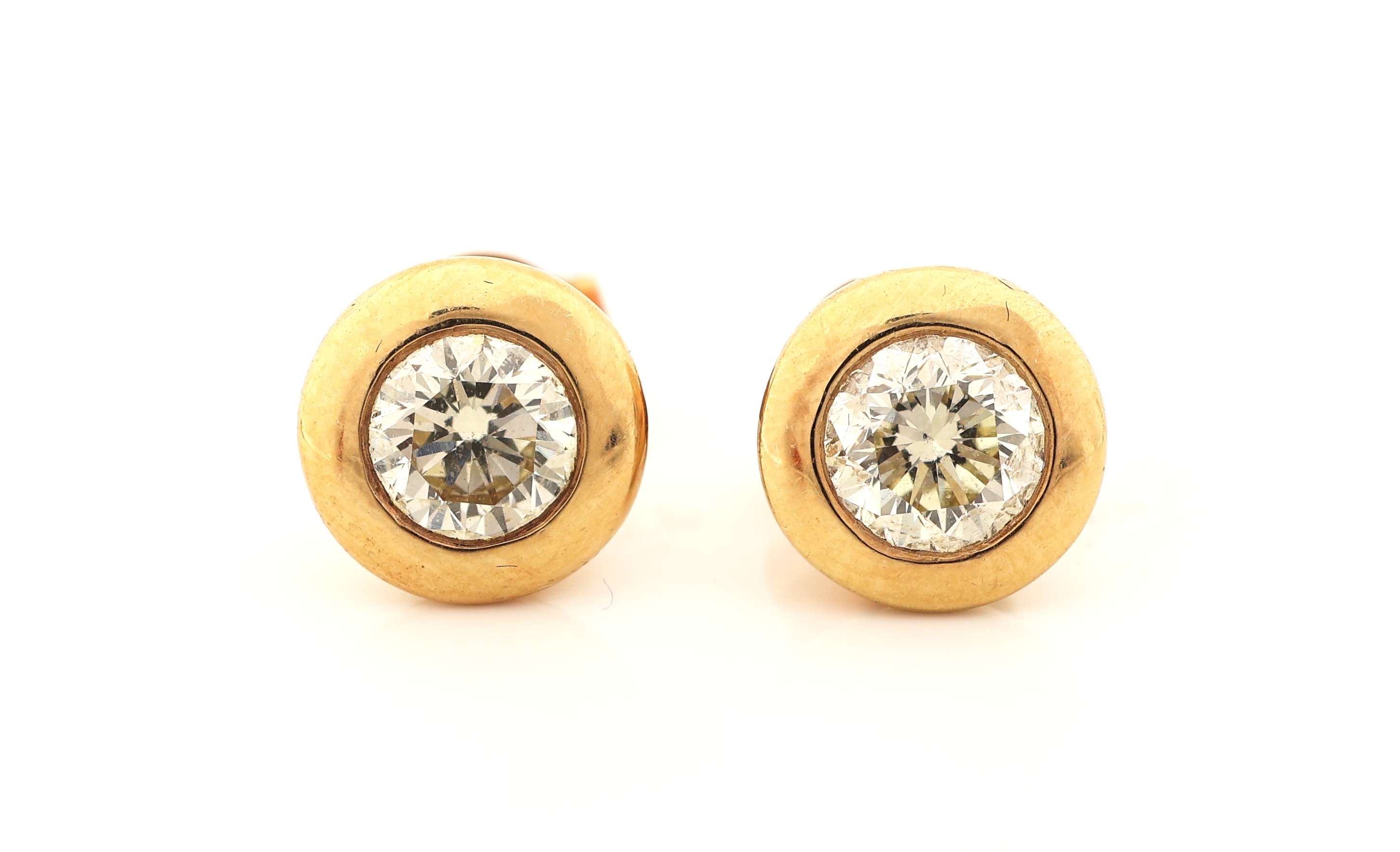 Detail c: Paar 18 kt Gold Brillant-Ohrstecker, GG 750/000, je 1 Brillant laut Galia-Expertise von 1997 je 0.557 ct l.get.Weiß/si1, Zargenfassung