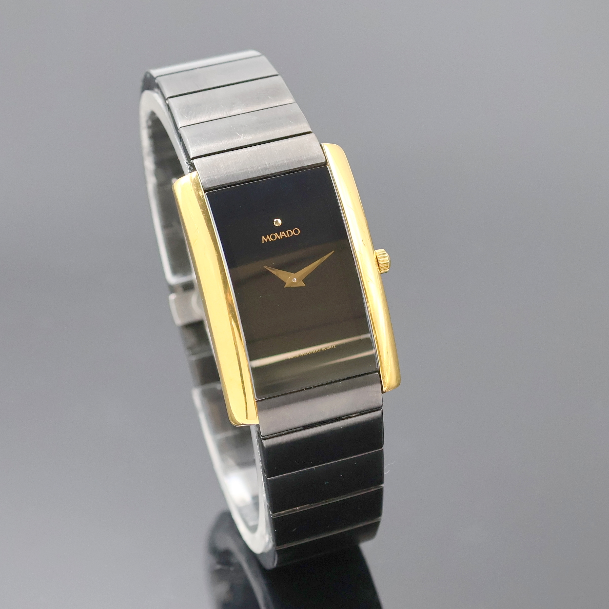 Detail b: MOVADO Museumswatch Referenz 87 c1 420.2, quarz, Schweiz 1990er Jahre, verg. Metallgeh. inkl. geschw. Gliederband m. dopp. Faltschl., Edelstahlboden ...