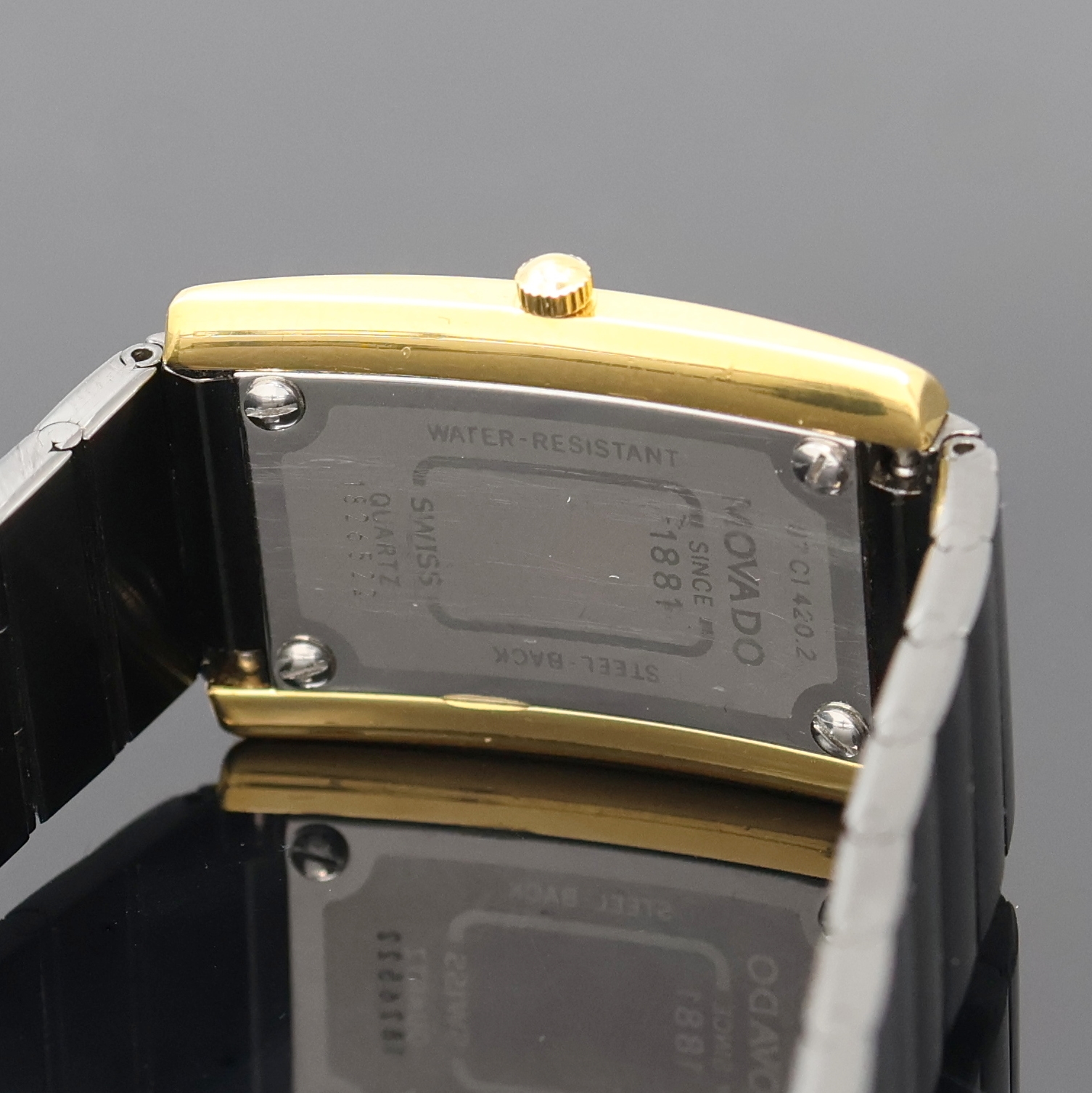 Detail e: MOVADO Museumswatch Referenz 87 c1 420.2, quarz, Schweiz 1990er Jahre, verg. Metallgeh. inkl. geschw. Gliederband m. dopp. Faltschl., Edelstahlboden ...