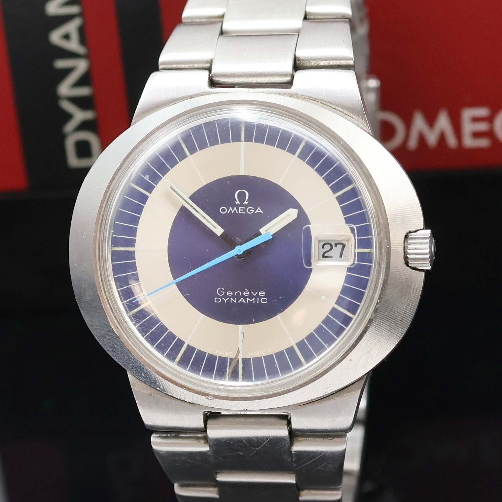 Detail a: OMEGA Geneve Dynamic Herrenarmbanduhr in Stahl Referenz 166.039, Schweiz um 1970, Handaufzug, ovales Monocoque-Geh., orig. Gliederband m. Faltschl., ...
