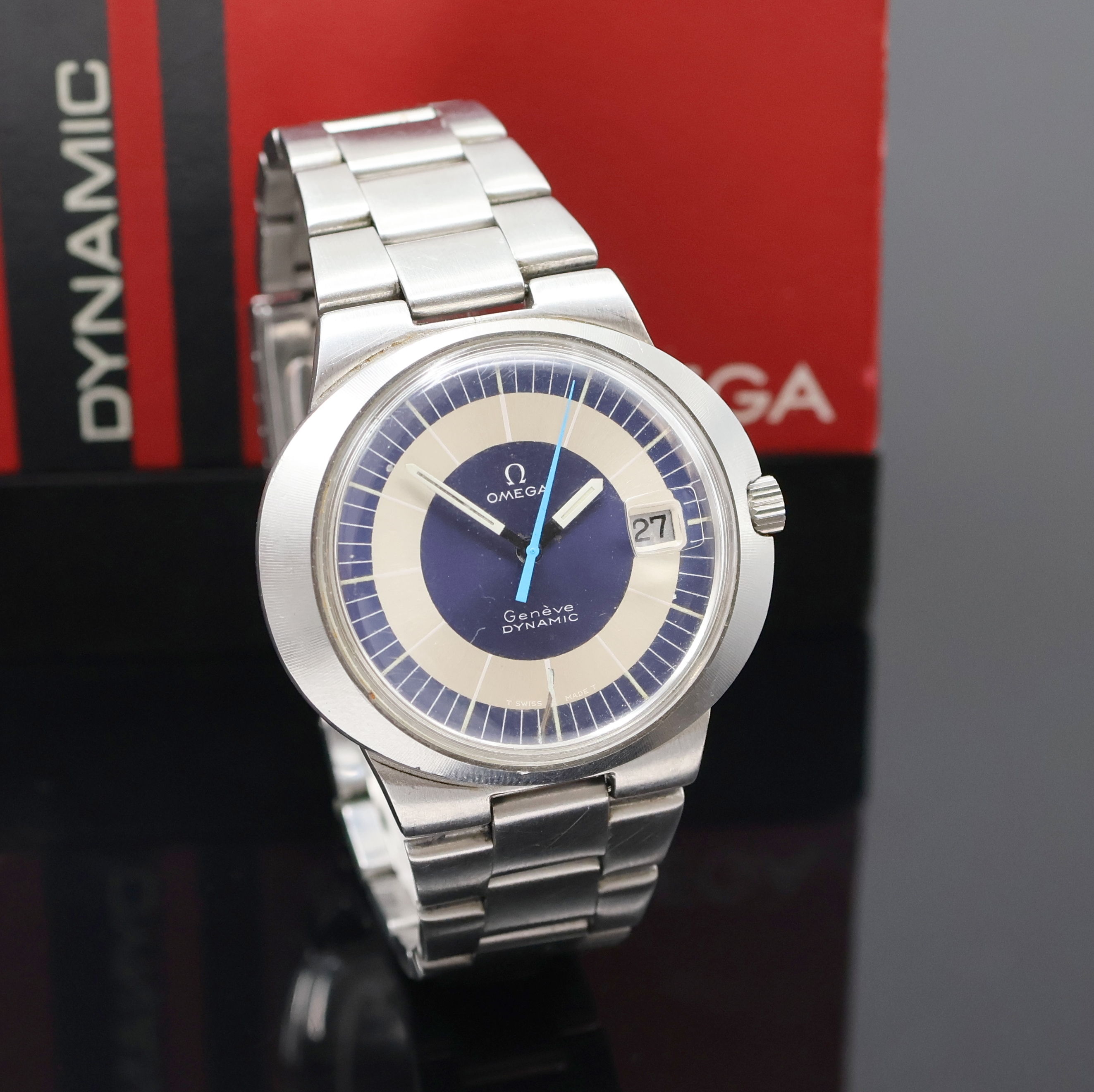 Detail b: OMEGA Geneve Dynamic Herrenarmbanduhr in Stahl Referenz 166.039, Schweiz um 1970, Handaufzug, ovales Monocoque-Geh., orig. Gliederband m. Faltschl., ...