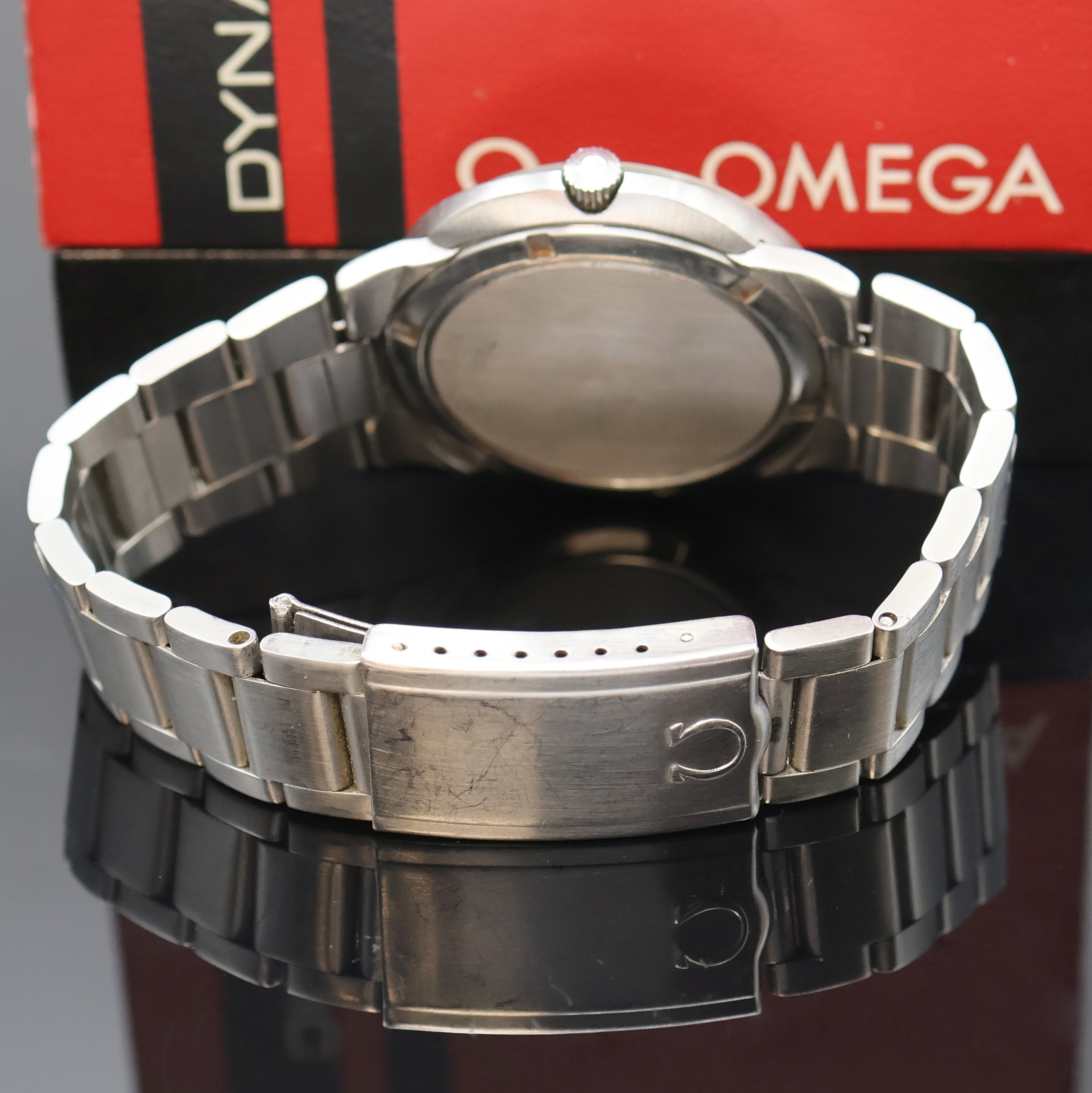 Detail c: OMEGA Geneve Dynamic Herrenarmbanduhr in Stahl Referenz 166.039, Schweiz um 1970, Handaufzug, ovales Monocoque-Geh., orig. Gliederband m. Faltschl., ...