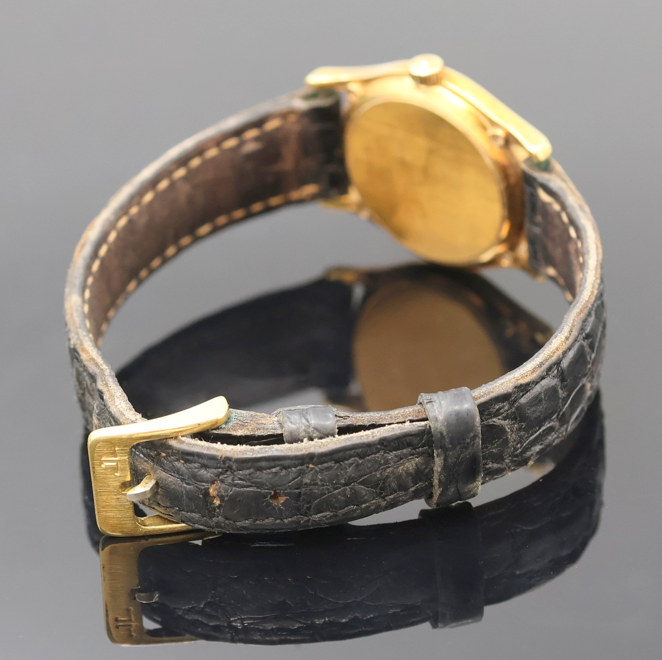 Detail c: Jaeger-LeCoultre Damenarmbanduhr in GG 750/000 Referenz 140.130.1, Schweiz um 1998, quarz, Boden 4-fach verschr., Lederband m. orig. verg. Dornschl., ...