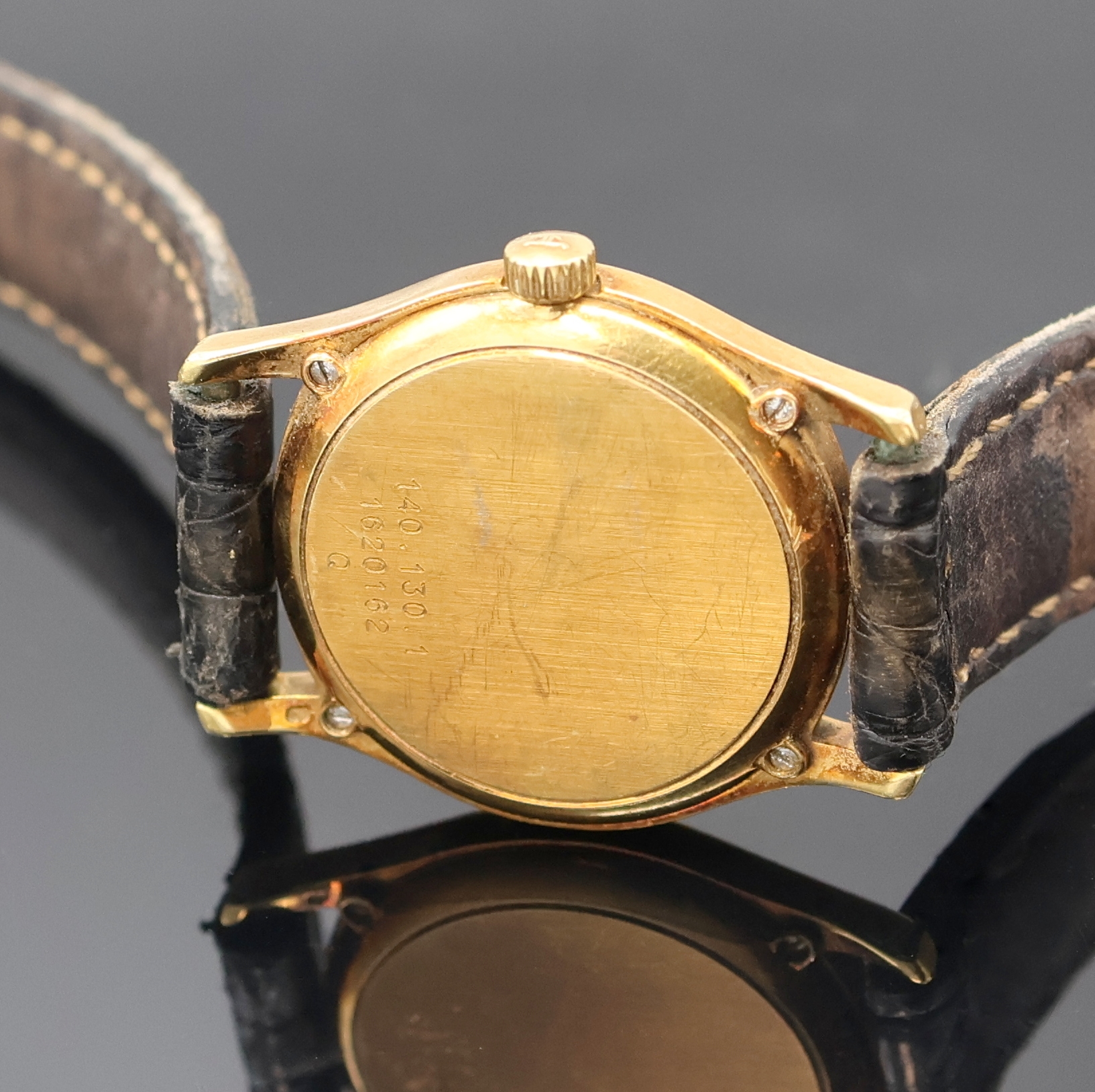 Detail e: Jaeger-LeCoultre Damenarmbanduhr in GG 750/000 Referenz 140.130.1, Schweiz um 1998, quarz, Boden 4-fach verschr., Lederband m. orig. verg. Dornschl., ...