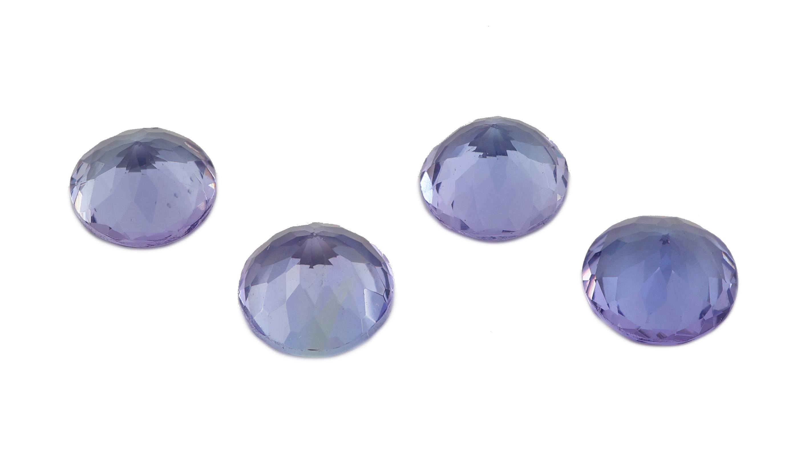 Detail a: Lot 4 lose Tansanite, zus. ca. 4.40 ct, rundfacett. in versch. Größen und Farbnuancen