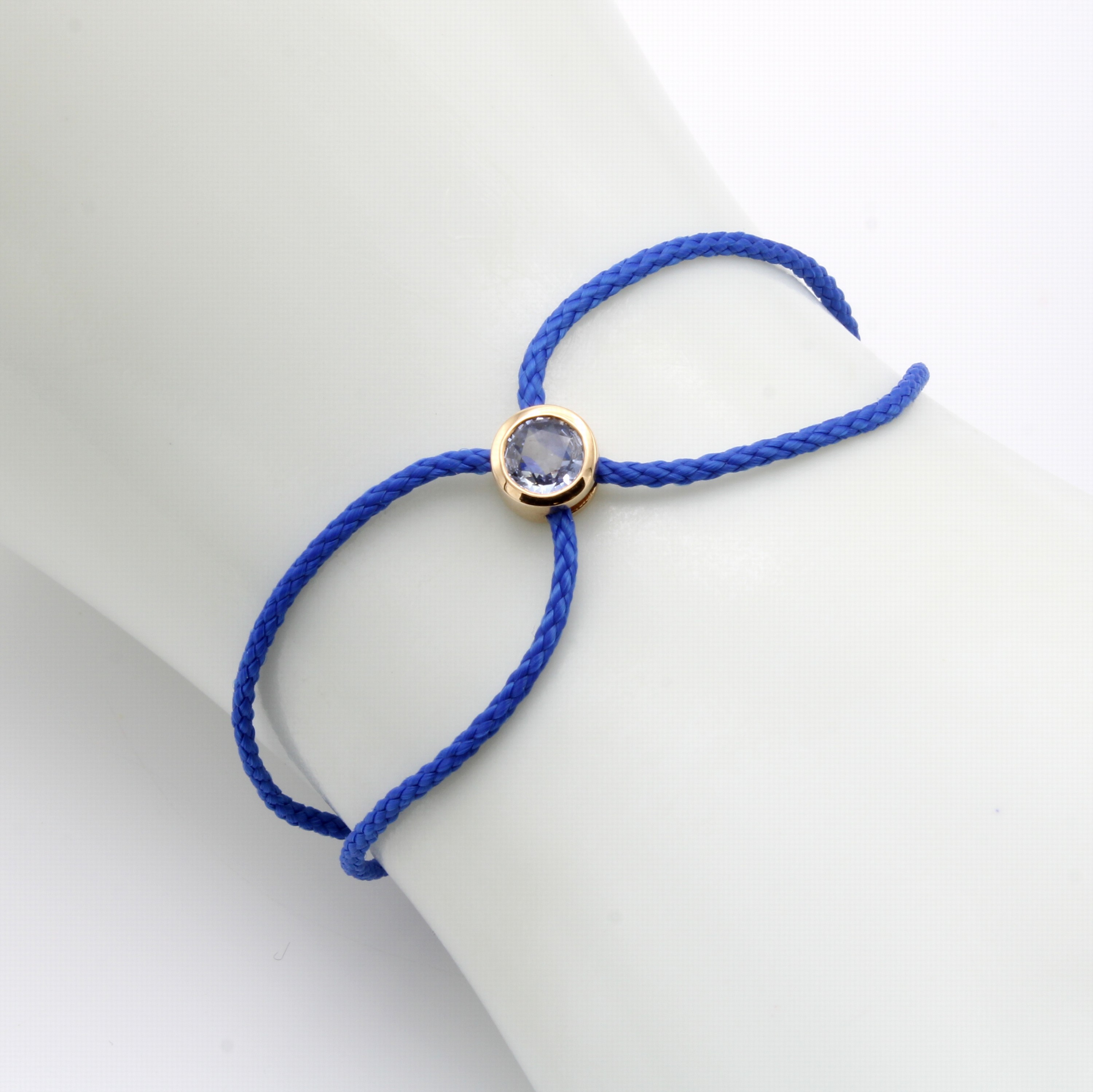 Image 27042814 - Blaues Stoffarmband mit Saphir, RG 750/000, Saphir ca. 0.54 ct, L. verstellbar ...