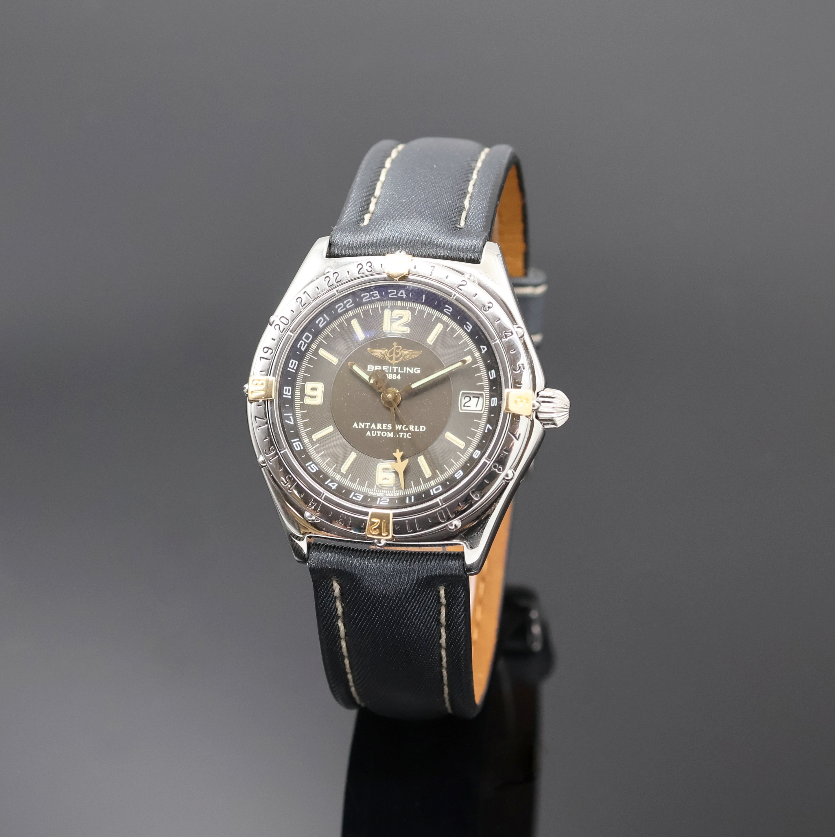 Detail a: BREITLING Antares World Armbanduhr mit 2. Zeitzone in Stahl Referenz B 32047, Schweiz um 1995, Automatik, Boden u. Krone verschr., Lünette beids. ...