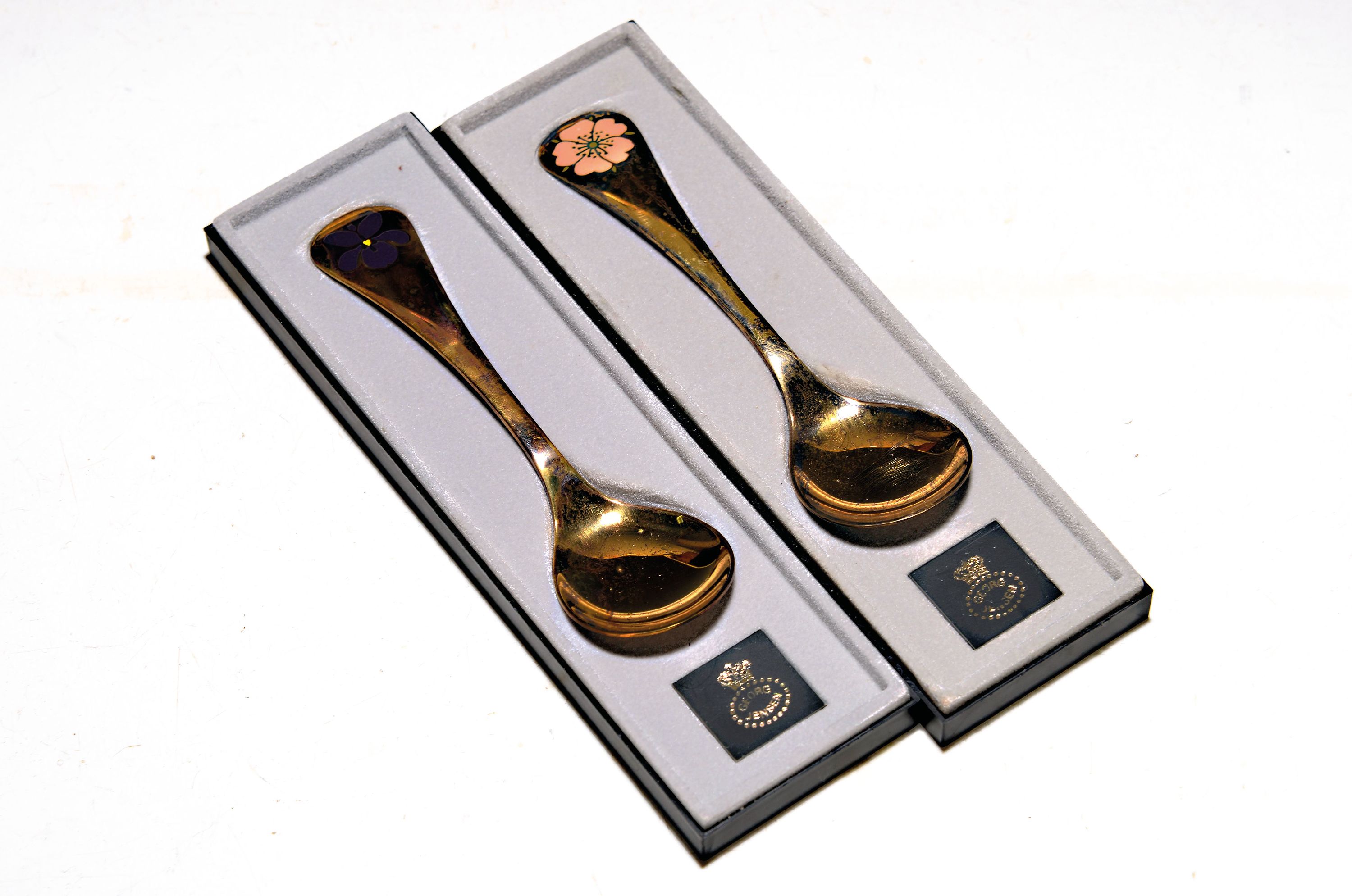 Image 27043671 - Two annual spoons 1976 and 1977, Georg Jensen,Denmark, 925 silver, gold-plated, enamel ...