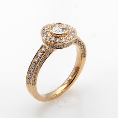 Image Ring mit Brillanten, RG 750/000, Mittelstein ca. 0.30 ct und Besatzbrill. zus. ca. 0.82 ...