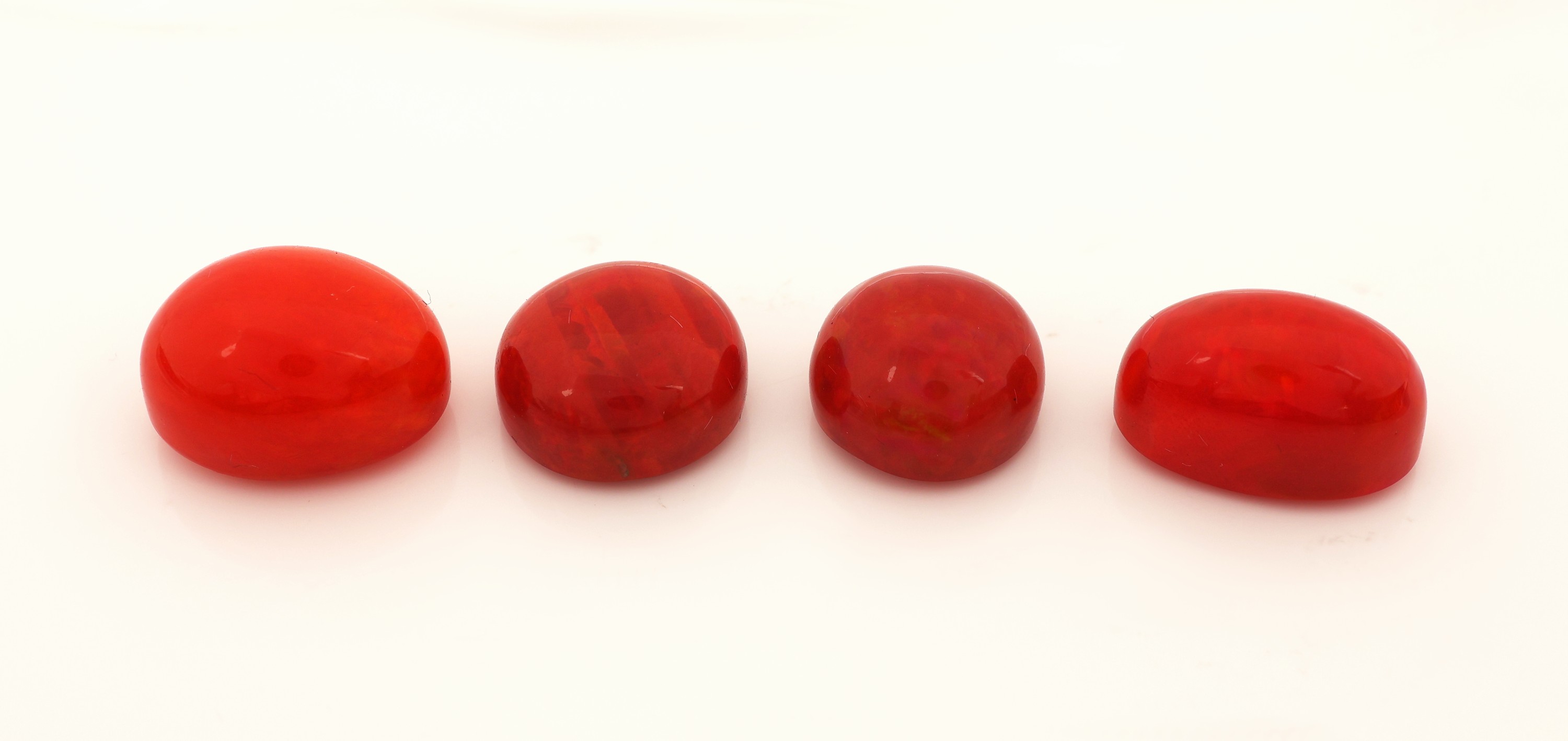Image 27044505 - Lot 4 lose rote Opale, zus. ca. 33.38 ct, 1 x 16.73 x 12.73 x 10.29 mm, 1 x 16.94 x 10.24 ...