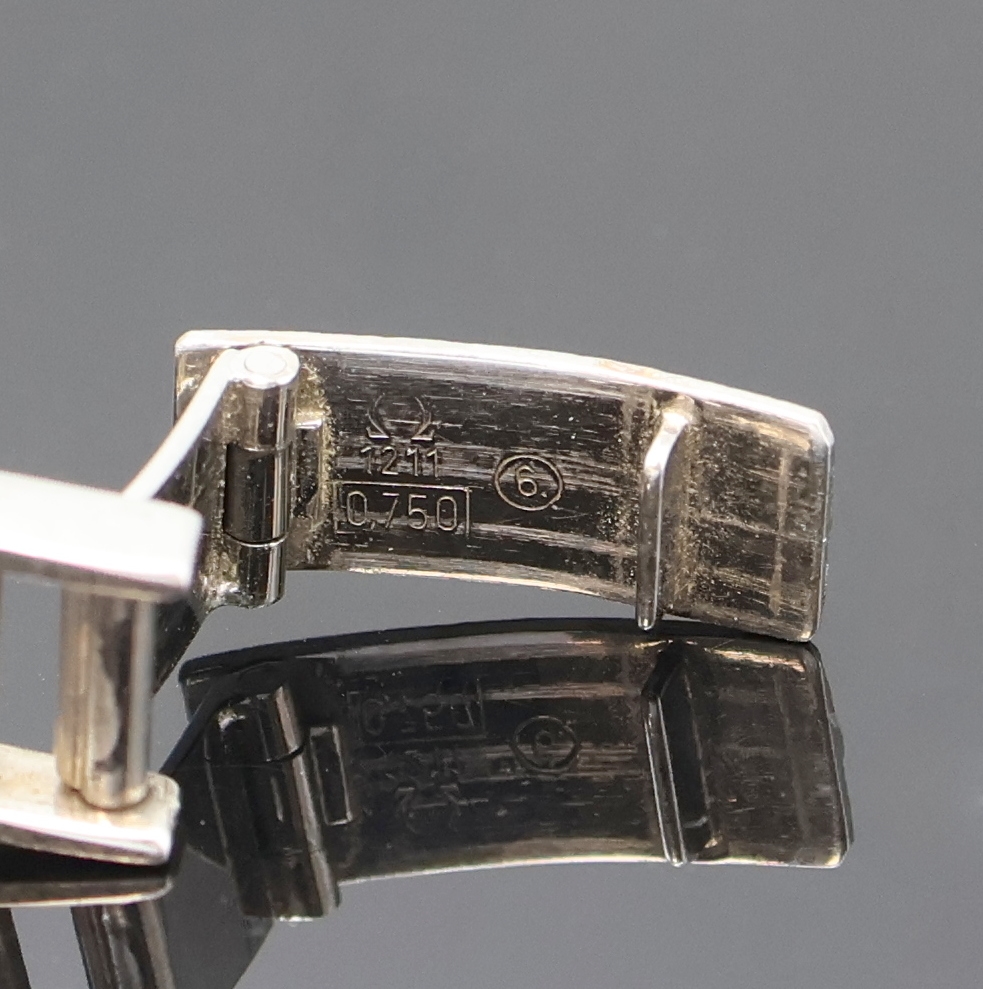 Detail d: OMEGA De Ville Damenarmbanduhr in WG 750/000 Referenz 1211, Handaufzug, Schweiz um 1969, 2-teil. Geh. inkl. orig. Milanaiseband, Boden aufgedr., ...