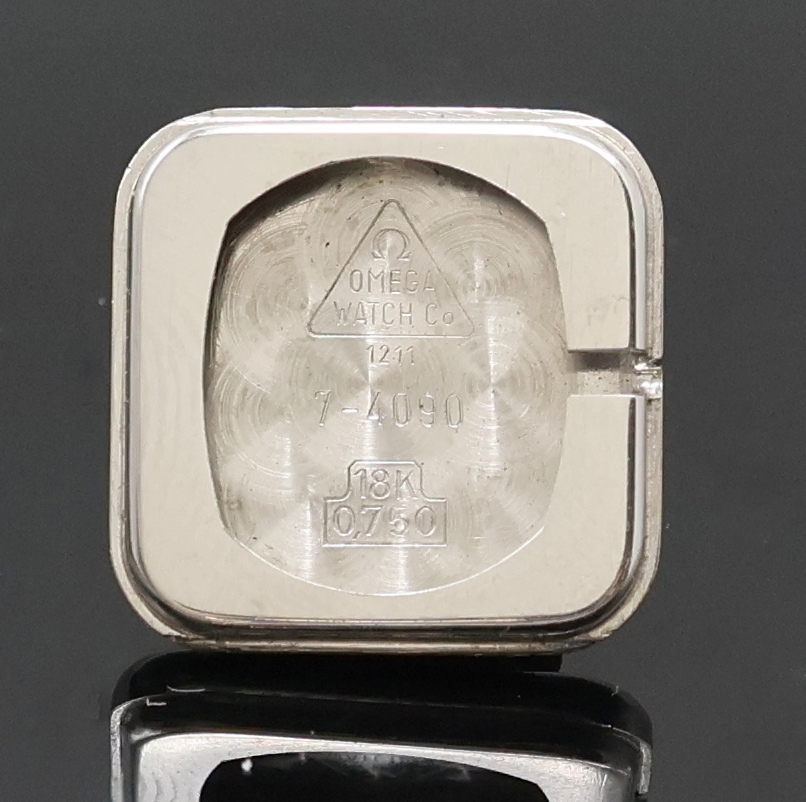 Detail h: OMEGA De Ville Damenarmbanduhr in WG 750/000 Referenz 1211, Handaufzug, Schweiz um 1969, 2-teil. Geh. inkl. orig. Milanaiseband, Boden aufgedr., ...