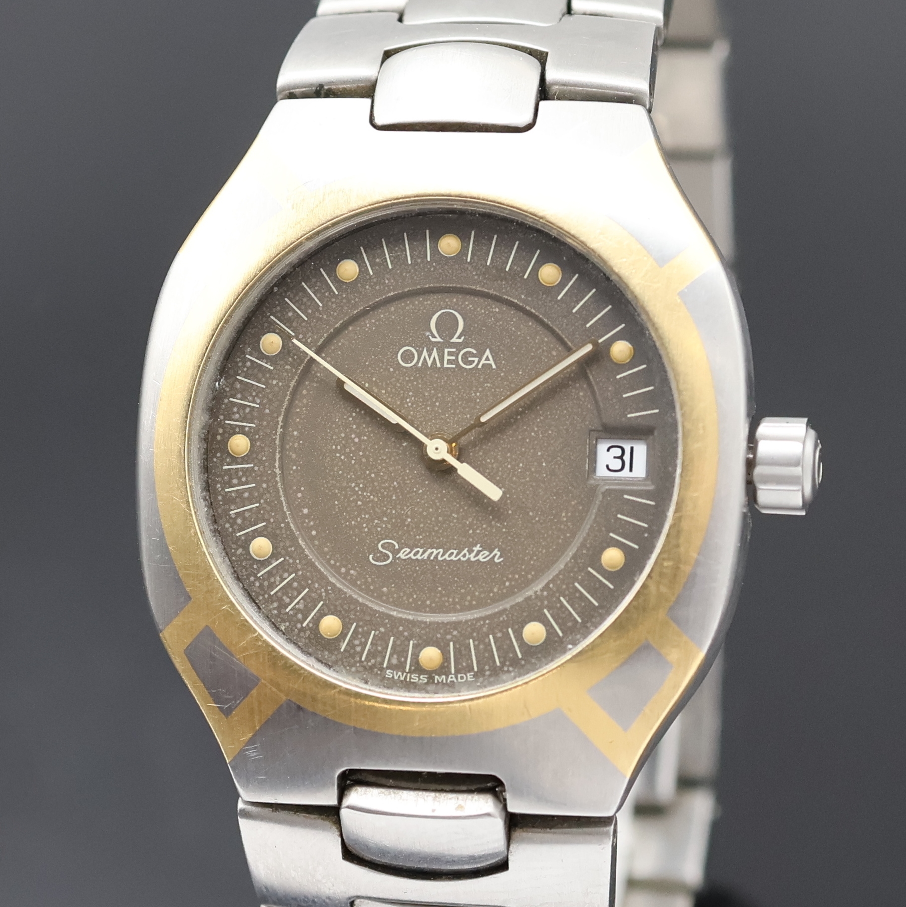 Detail a: OMEGA Seamaster Polaris Armbanduhr Referenz 396.1022/396.1222, Schweiz um 1990, quarz, Edelstahlgeh. GG intarsiert, orig. Gliederband m. Faltschl., ...