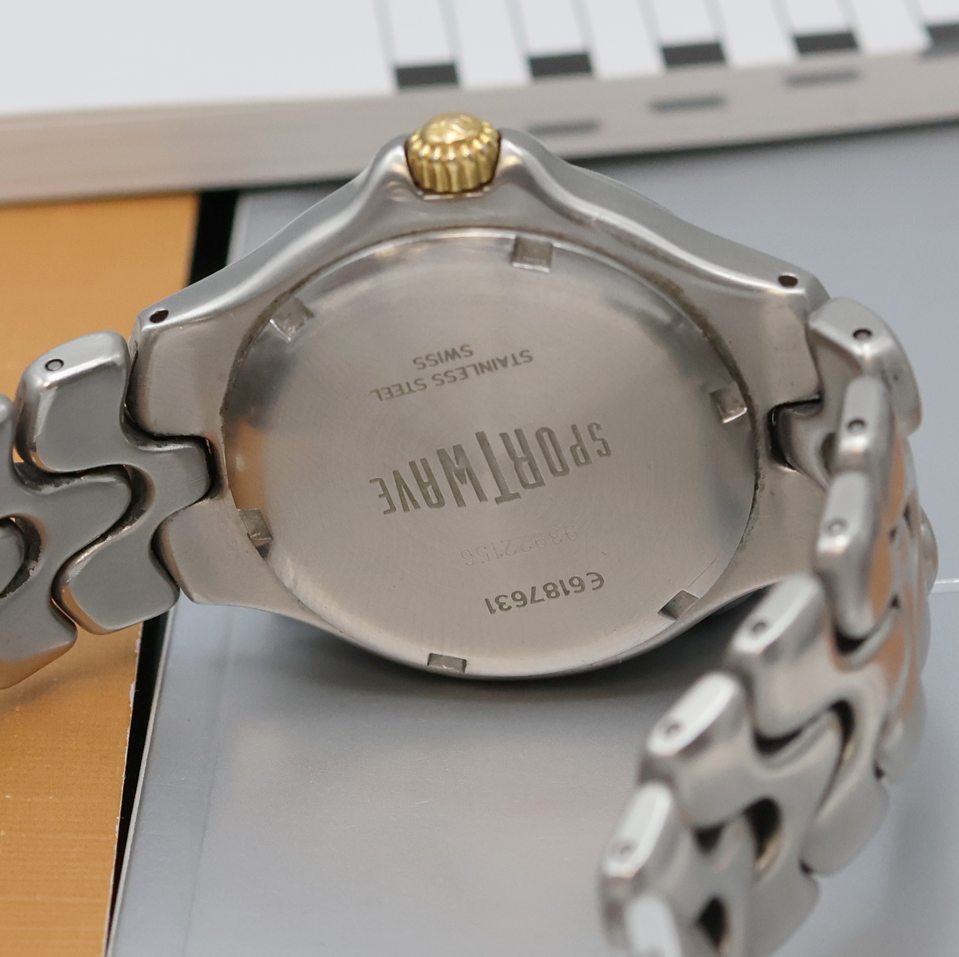 Detail e: EBEL Herrenarmbanduhr Model Sportwave Referenz 6187631, quarz, Edelstahl/Gold komb. inkl. Gliederband m. dopp. Faltschl., Boden verschr., weißes ...