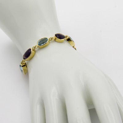 27046460a - Gliederarmband mit Amethysten und Aquamarinen, GG 585/000, Farbsteine in versch. Formen ...
