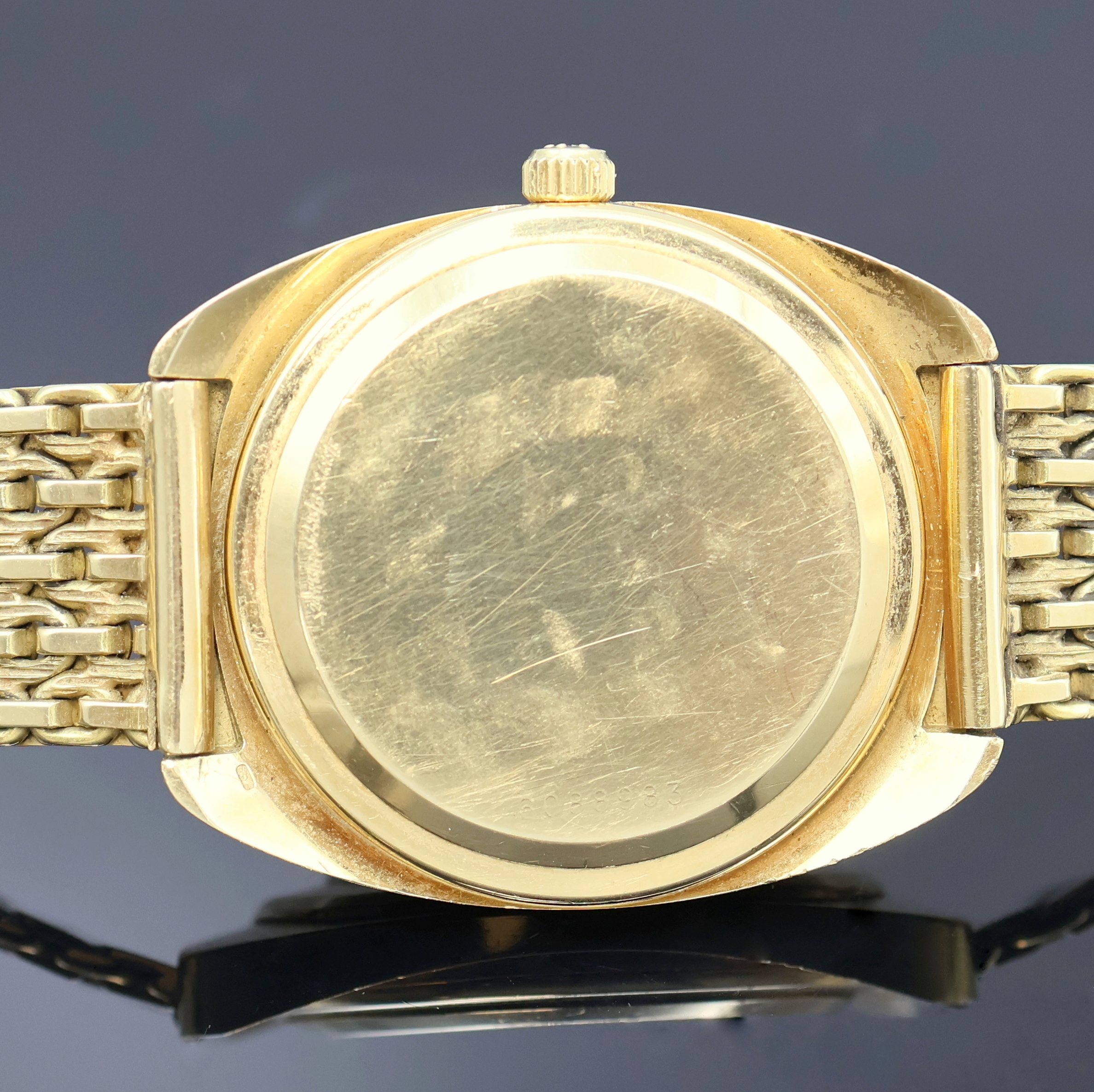 Detail g: ETERNA Sonic Electronic De Luxe Herrenarmbanduhr in GG 750/000, Schweiz um 1970, Boden aufgedr., Eterna Goldband, gold. Strukturzifferbl. m. aufges. ...