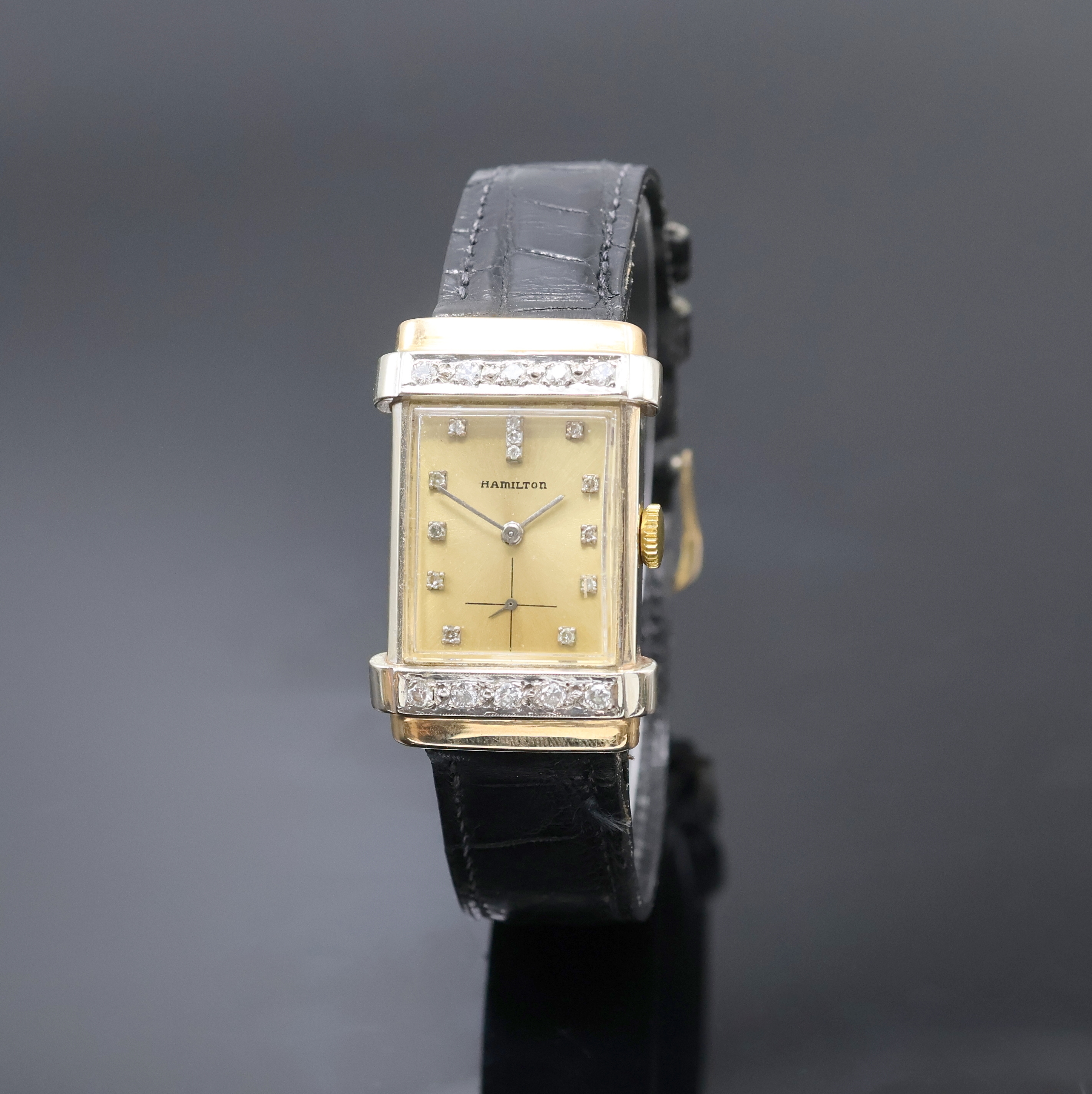 HAMILTON Armbanduhr 14k Gold filled mit Diamanten, USA um 1955, Handaufzug, Boden aufgedr., Geh. teils m. Diamanten bes., champagnerfarb. Zifferbl. ...
