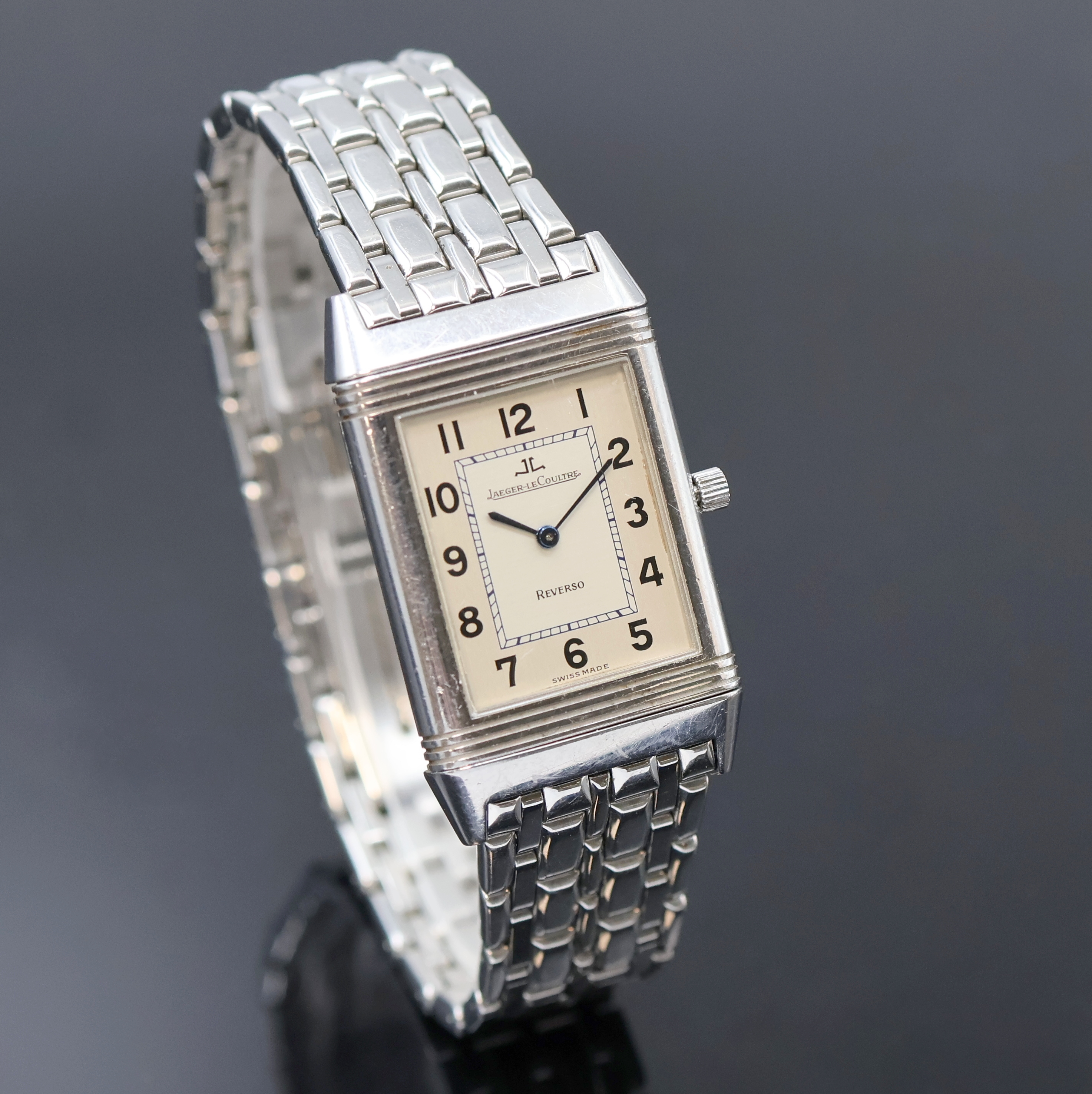 Detail b: Jaeger-LeCoultre Reverso Herrenarmbanduhr in Edelstahl Referenz 250.8.86, Schweiz um 1992, Handaufzug, um 180 Grad drehbares Wendegehäuse inkl. ...