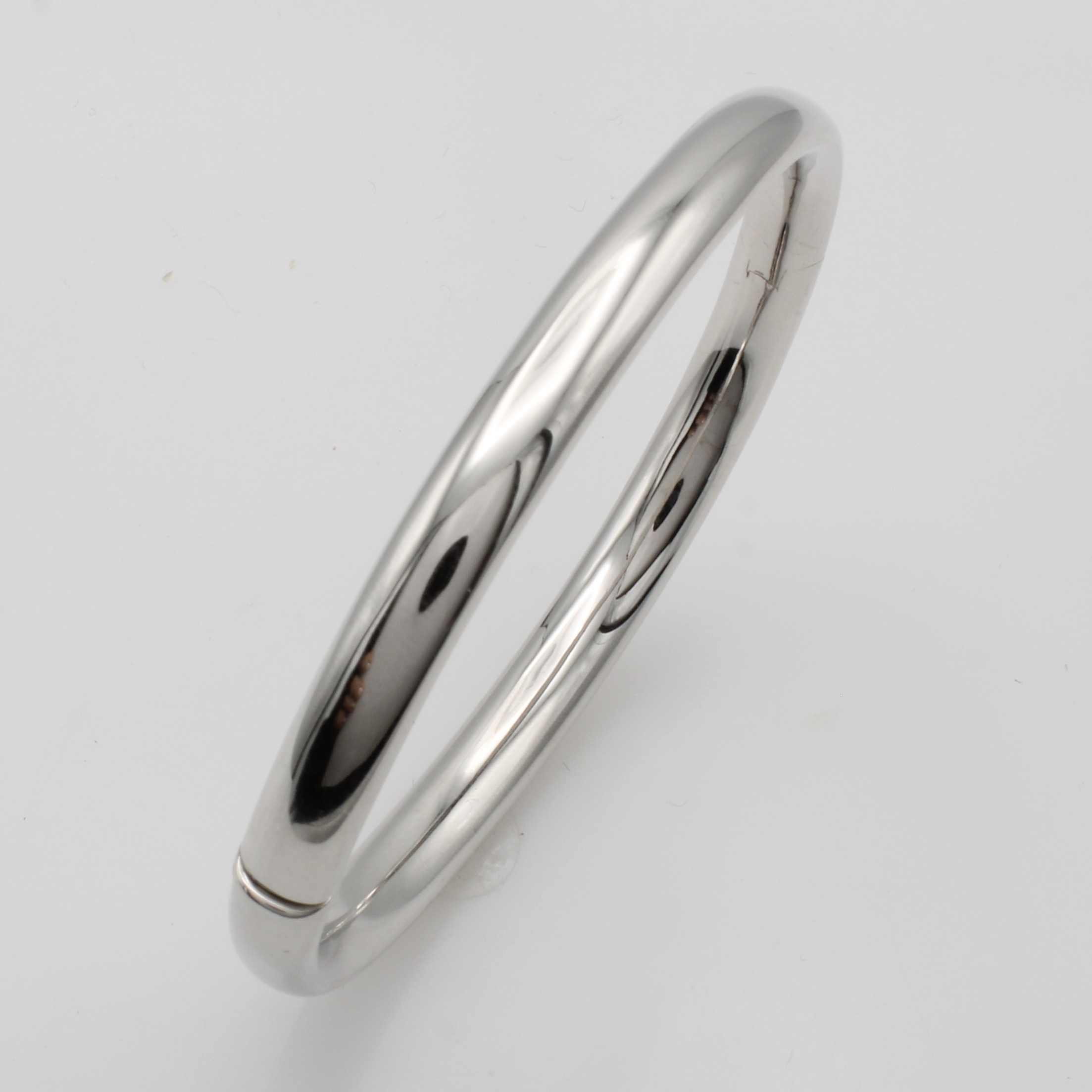 Image 27048454 - Armreif, WG 585/000, B. ca. 6 mm, M. ca. 6.5x5.5 cm, mit Scharnier