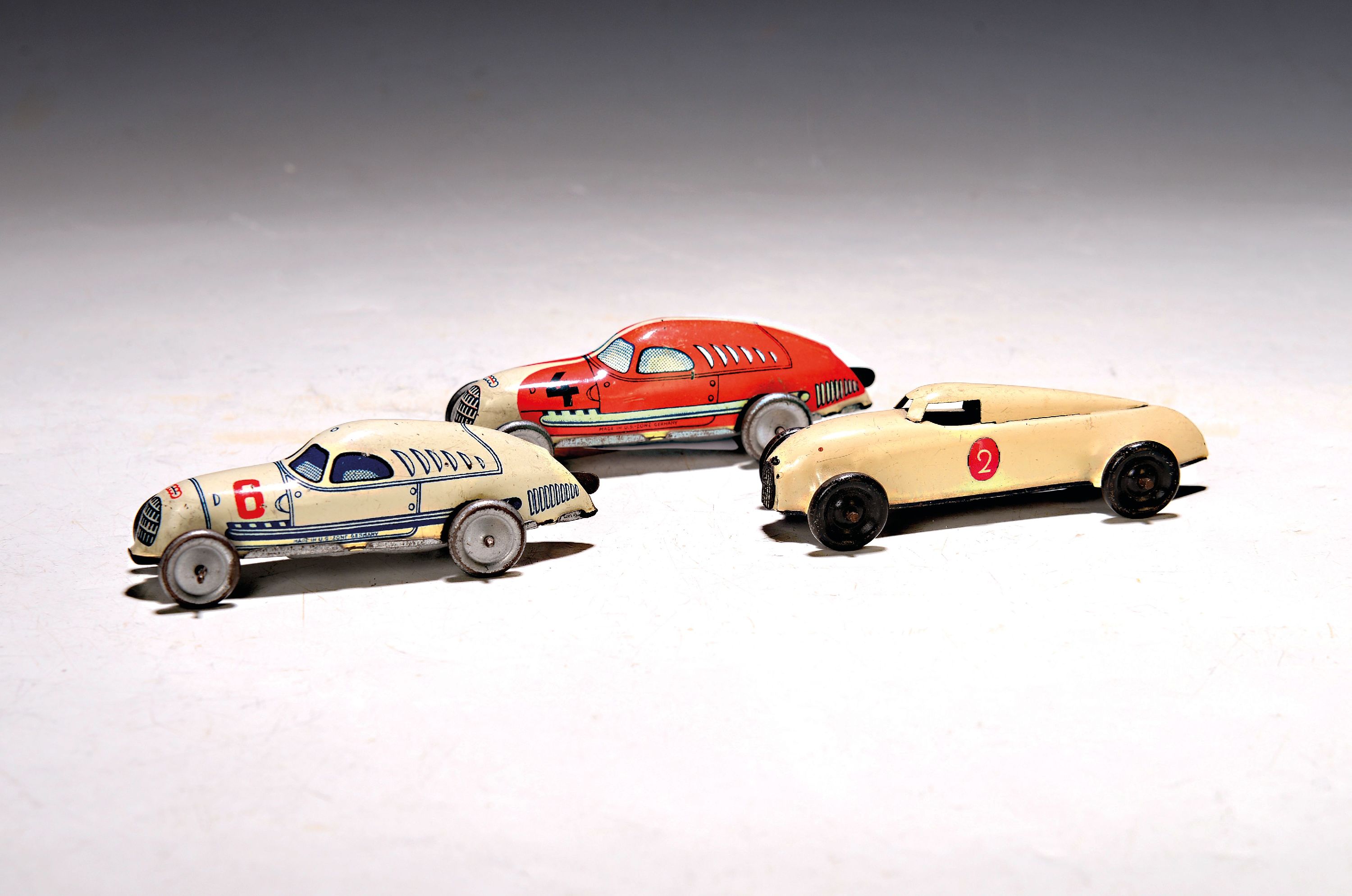 3 Rennwagen, Tipp Co und Lehmann, 2 Rennwagen Audi für die Reichsautobahn, Nr. 6 und NR. 4, Federantrieb,, L. ca. 10 cm und Lehmann Gnom-Rennwagen, ...