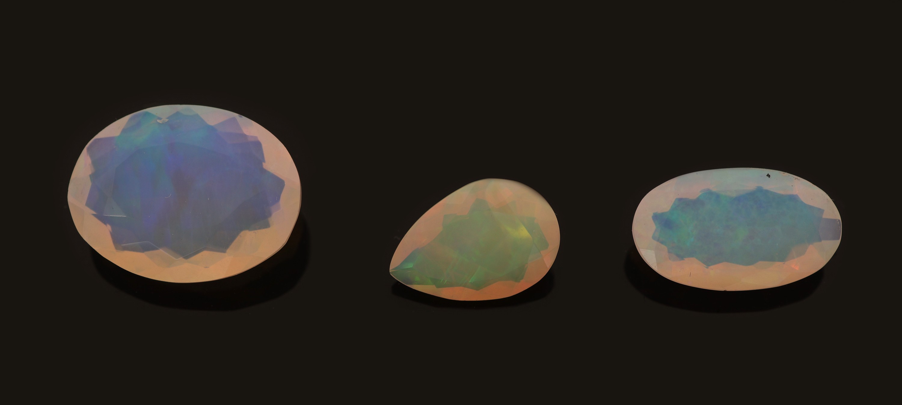 Image 27049293 - Lot 3 lose facett. Opale, zus. ca. 10.20 ct, 1x facett. Tropfen, 2 x ovalfacett., versch. ...