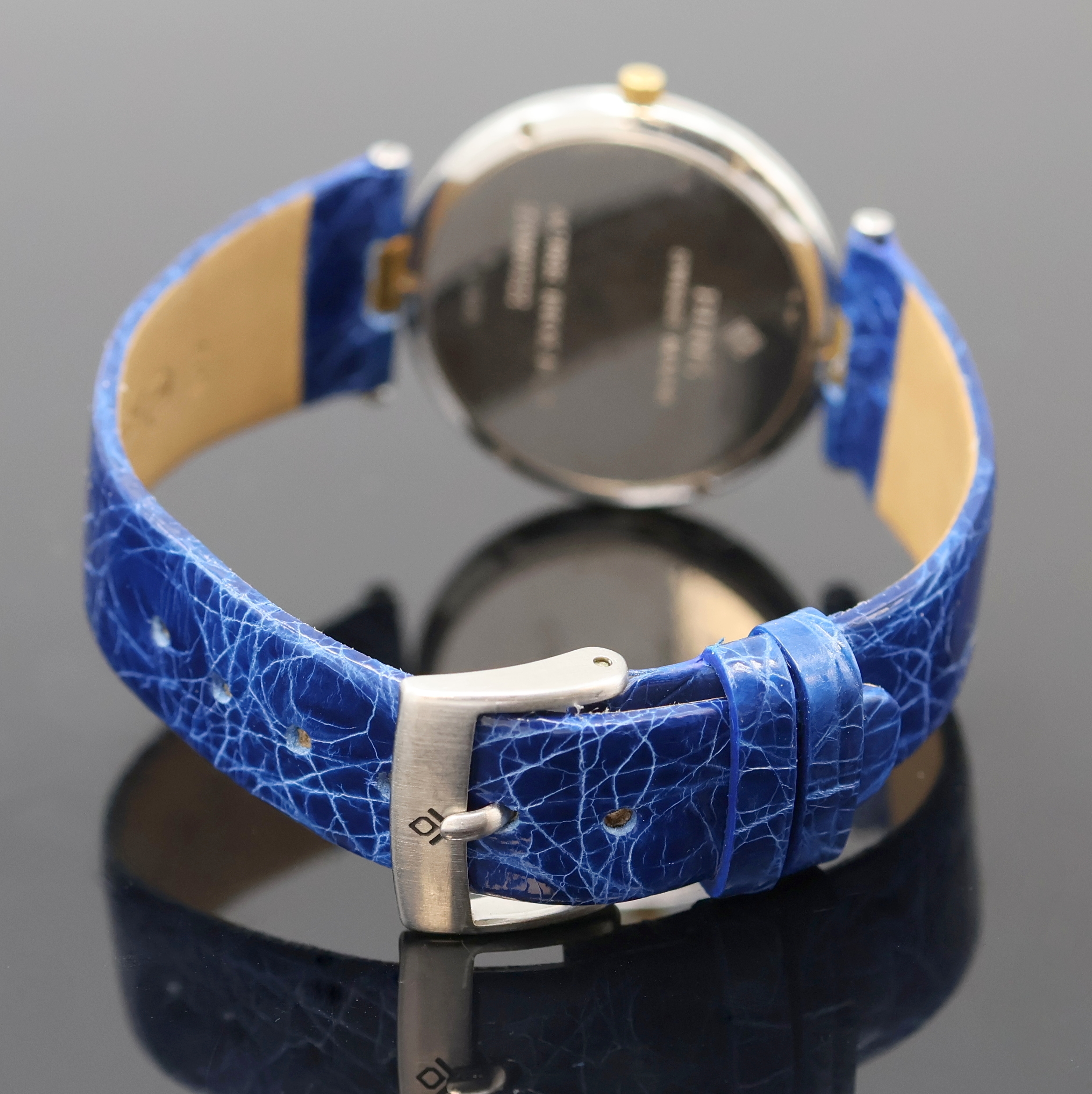 Detail c: BUNZ Design-Armbanduhr Referenz 27010322, Schweiz um 2005, quarz, Edelstahl/Gold inkl. neutr. Lederband m. orig. Dornschl., Boden 6- fach verschr., ...