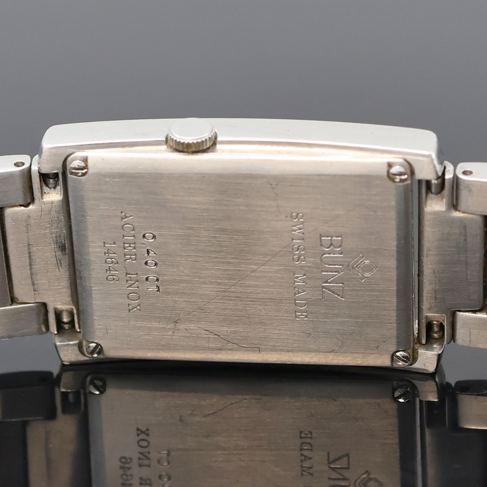 Detail e: BUNZ ausgefallene Armbanduhr Diamondtime, Schweiz um 2005, quarz, Edelstahl inkl. Gliederband m. dopp. Faltschl., Boden 4-fach verschr., Geh. sowie ...