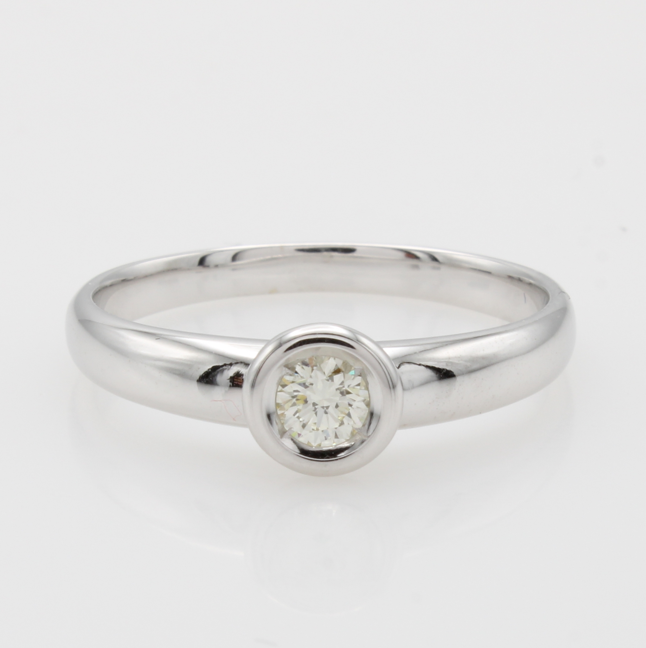 Image 27049884 - Ring mit Brillantsolitär, WG 585/000, Brill. in Zargenfassung ca. 0.25 ct ...