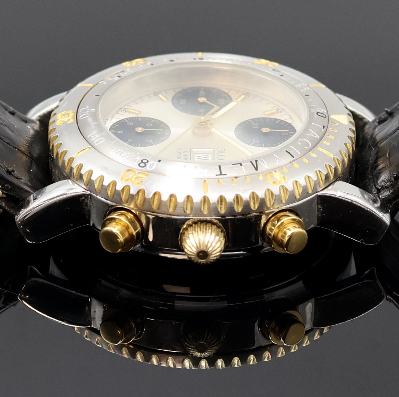 Detail b: BULOVA Armbandchronograph Referenz 4.043.0.0.80, Schweiz um 1995, Automatik, Edelstahl/verg., Boden verschr., Lünette m. 60er Teilung eins. drehb., ...
