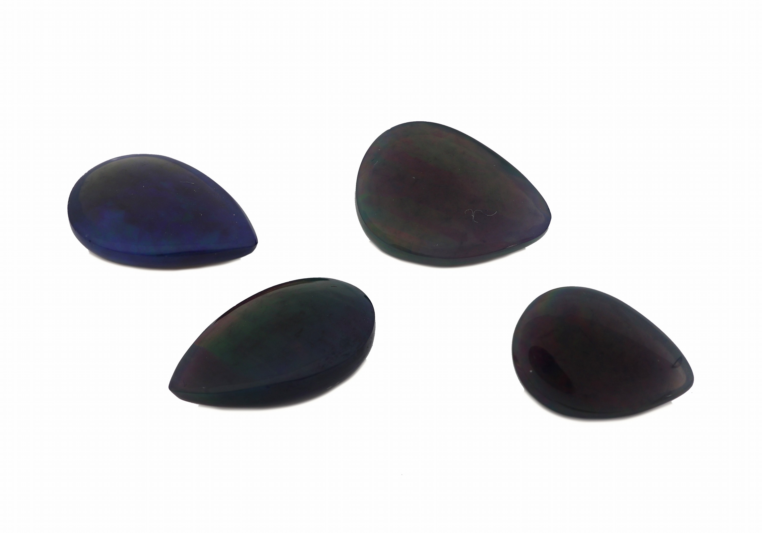 Detail a: lot 4 lose schwarze Opale, zus. ca. 12.05 ct, tropfenf. Cabochons in versch. Größen, Farbspiel in Blau, Grün und Rot