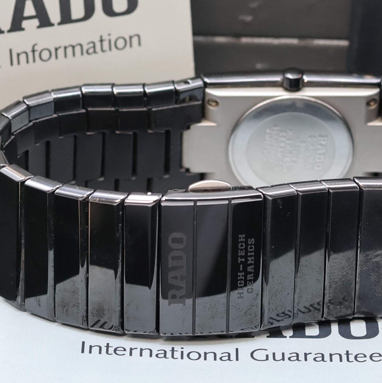 Detail b: RADO Diastar Armbanduhr Referenz 111.0348.3, Schweiz verk. lt. beil. Pap. 12/1993, quarz, Keramikgeh. inkl. Keramik-Gliederband m. dopp. ...