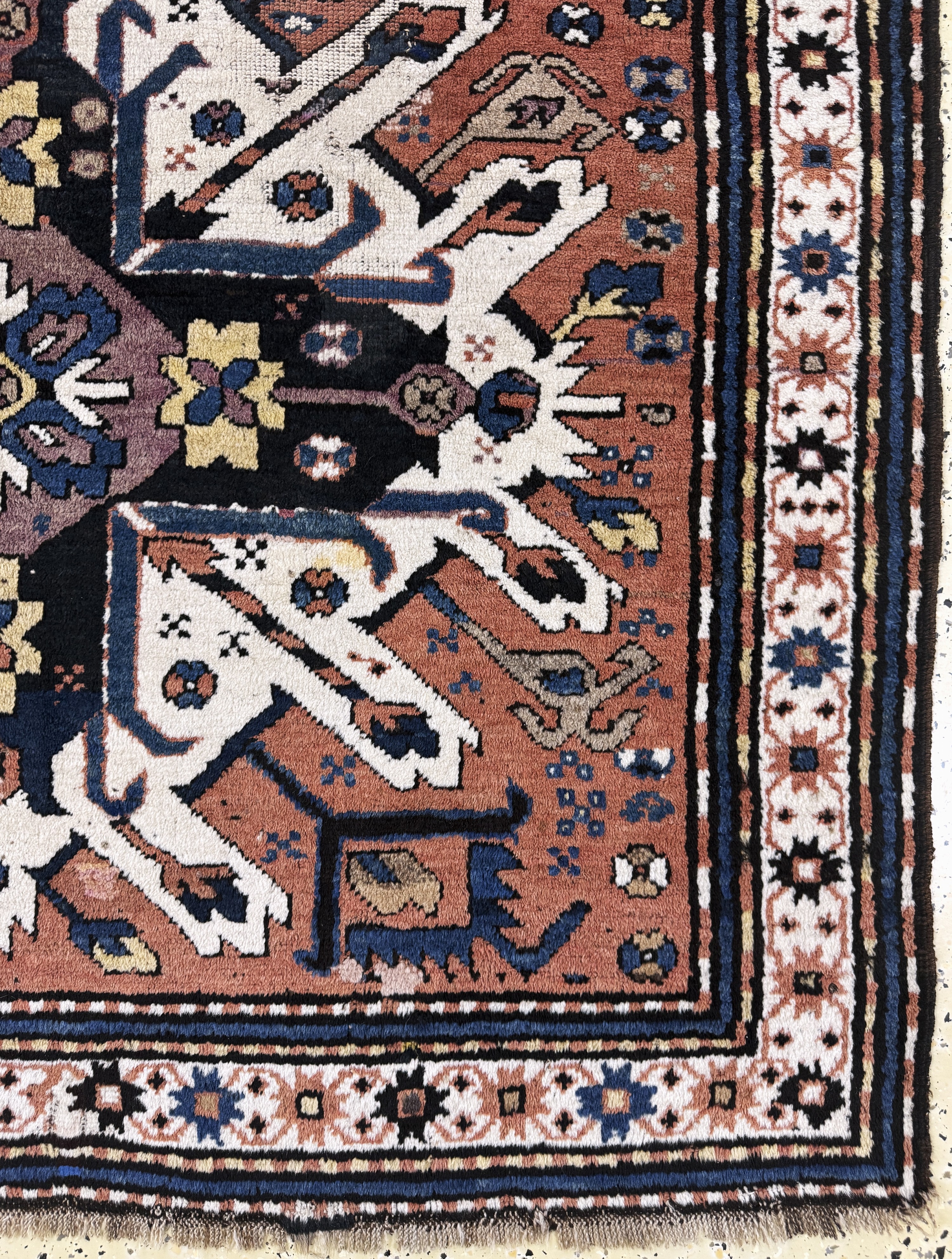 Detail a: Tschelaberd"Adler-Kazak", Kaukasus, 19.Jhd,Wolle auf Wolle, ca. 233 x 165 cm, EHZ: 3, (restaurierte Stellen)