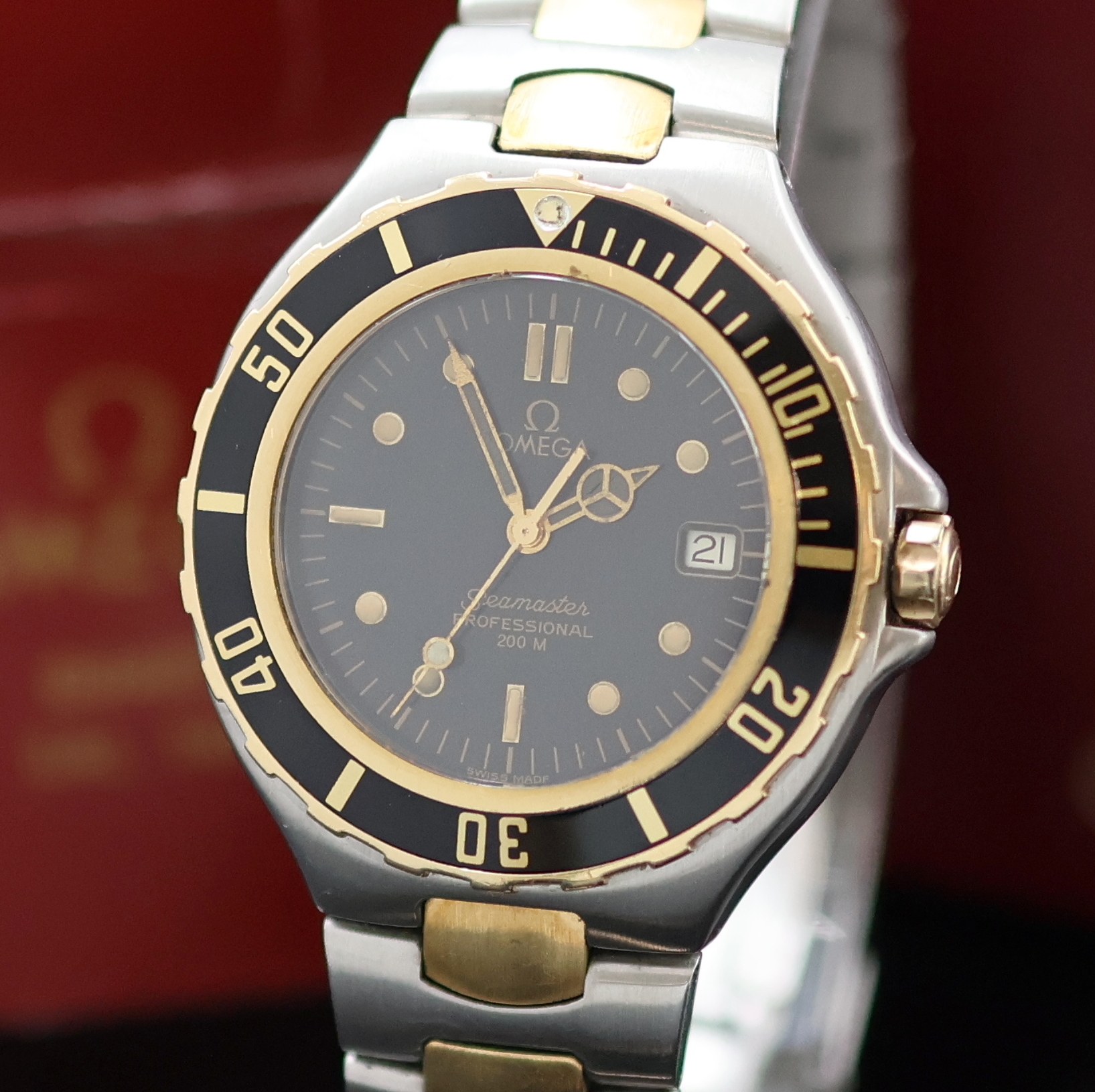 Detail a: OMEGA Herrenarmbanduhr Serie Seamaster Professional Referenz 396.1042, Schweiz um 1990, Edelstahl/Gold kombiniert inkl. Gliederband m. Faltschl. und ...