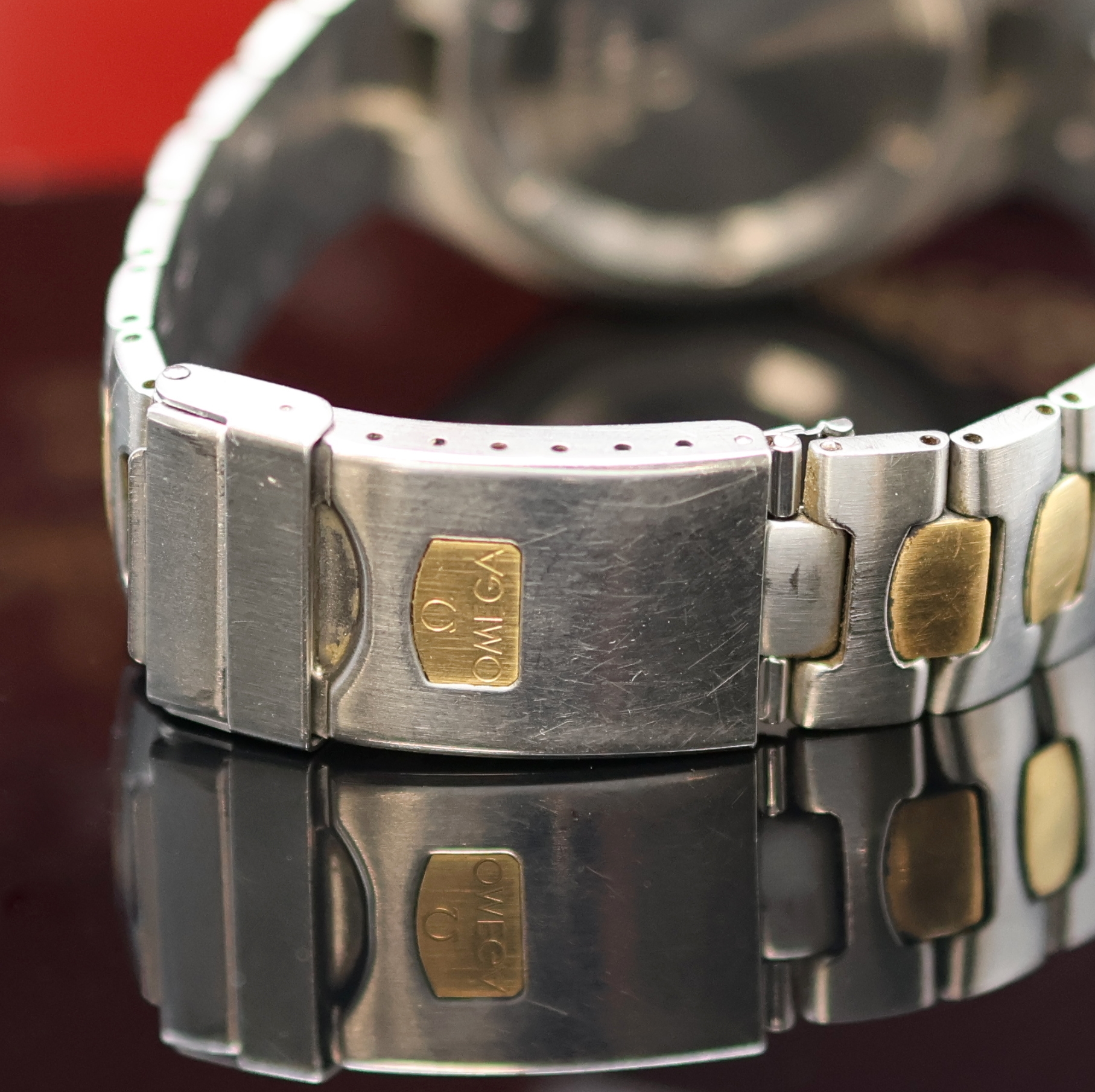 Detail d: OMEGA Herrenarmbanduhr Serie Seamaster Professional Referenz 396.1042, Schweiz um 1990, Edelstahl/Gold kombiniert inkl. Gliederband m. Faltschl. und ...