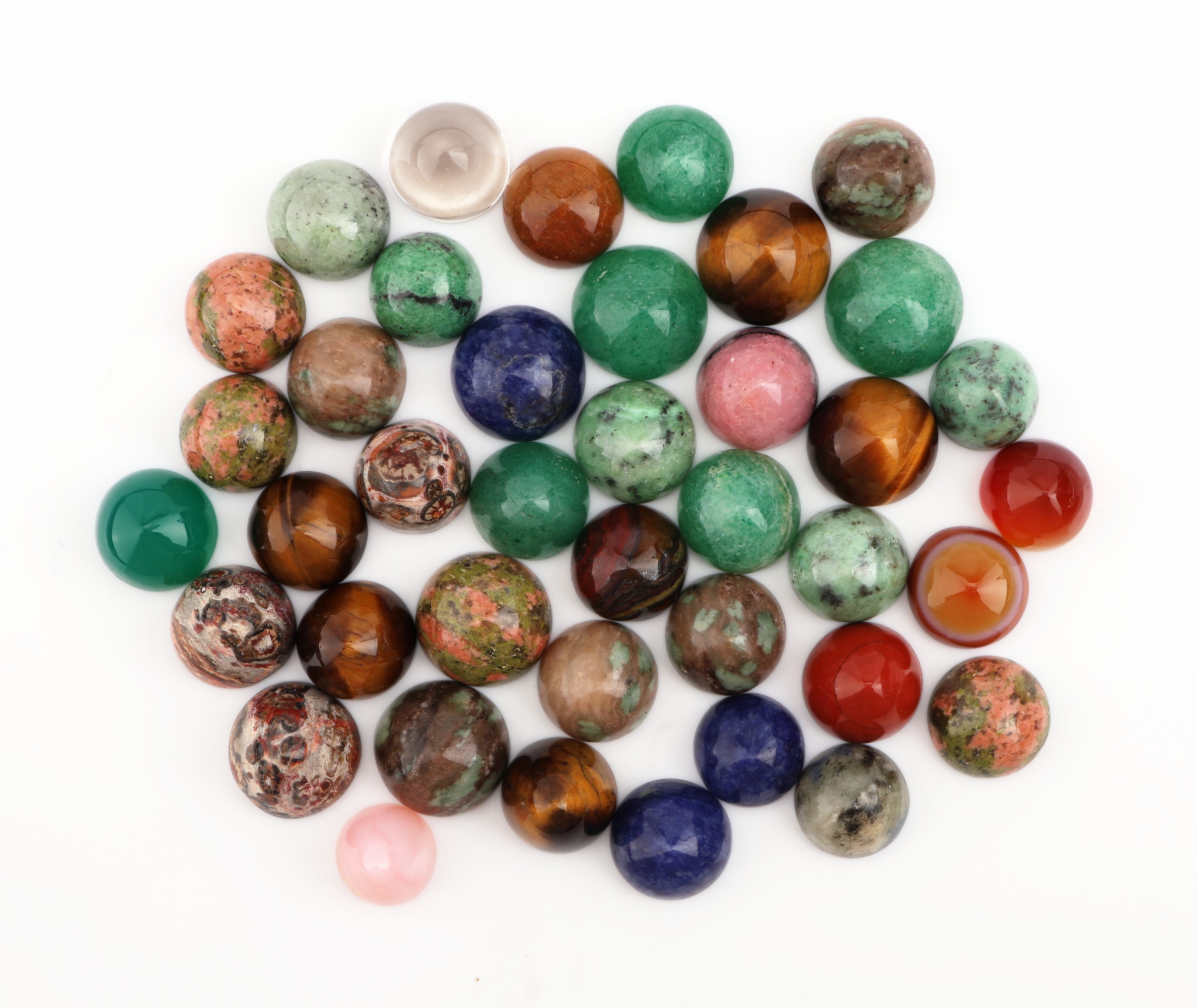 Image 27051469 - Lot lose Farbsteine, 291.60 ct, runde Cabochons, u.a. Tigerauge, Sodalith, Karneol, ...