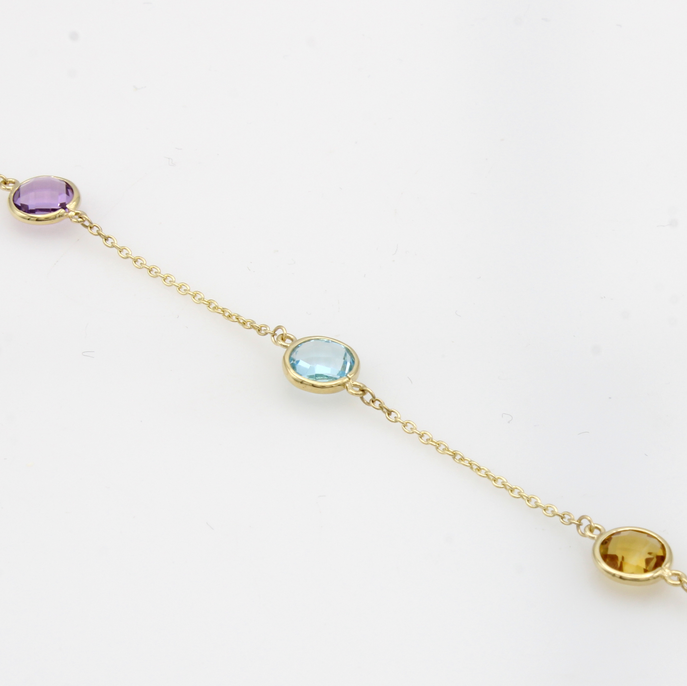 Image 27051495 - Rundankerarmband mit Farbsteinen, GG 585/ 000, je ein rund facett. Citrin und Blautopas ...