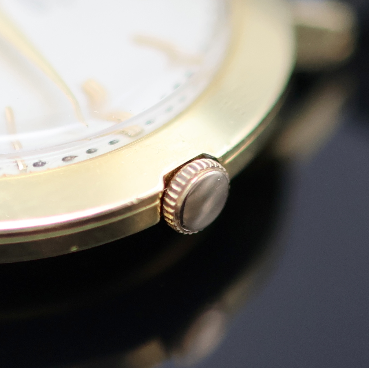 Detail c: GÜBELIN Ipsomatic Armbanduhr in GG 750/000, Schweiz um 1955, Handaufzug, Boden u. Glasrand gedr., silb. Zifferbl. rest., gold. Std.-Ind. u. Zeiger, ...