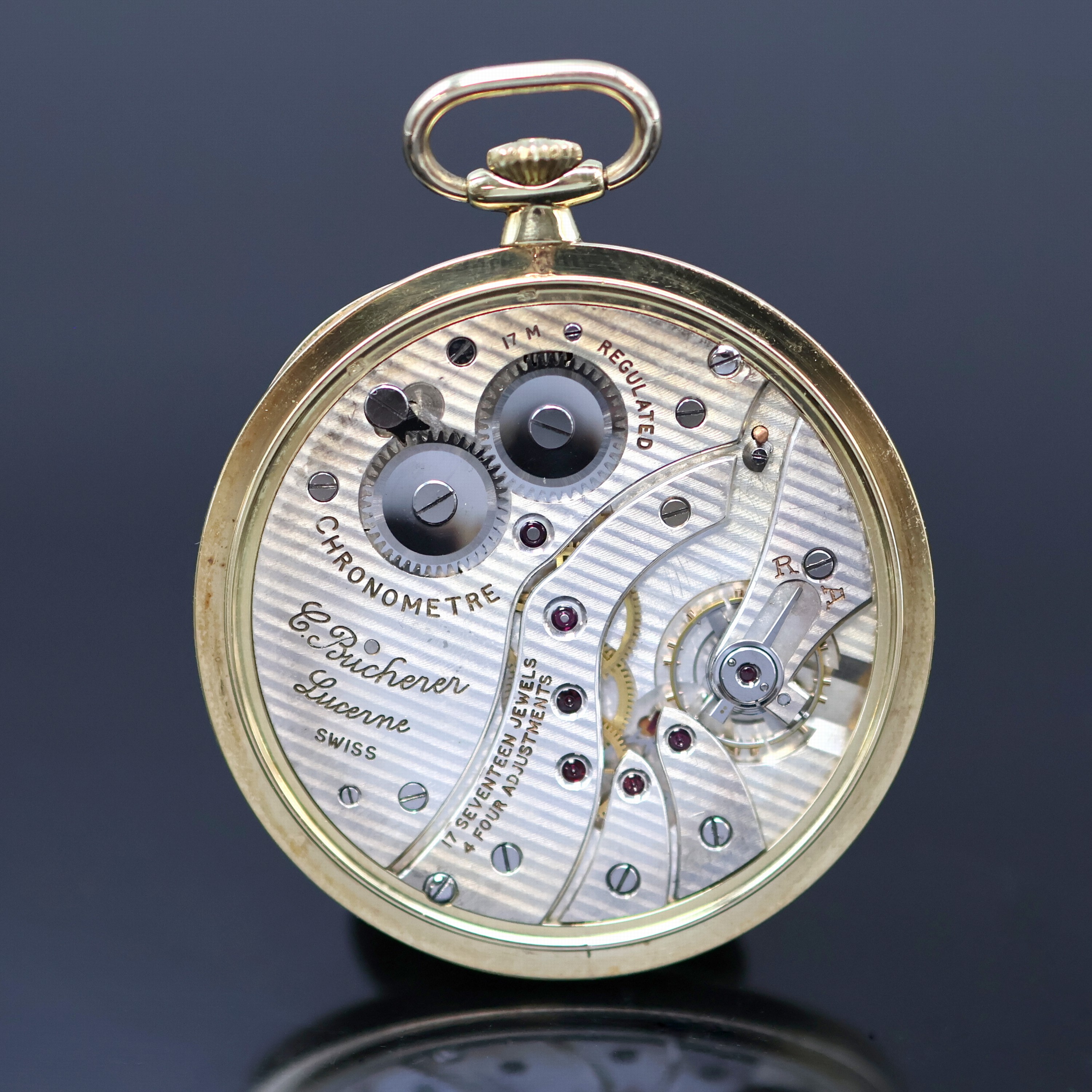 Detail c: BUCHERER Chronometer offene Taschen-/Frackuhr in GG 585/000 mit Chatelain in GG 585/000, Schweiz um 1935, Geh. l. dell., Boden aufgedr., goldfarb. ...