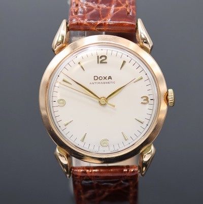 27051550a - DOXA Armbanduhr in RG 585/000, Schweiz um 1960, Handaufzug, tropfenförm. Anstöße, ...