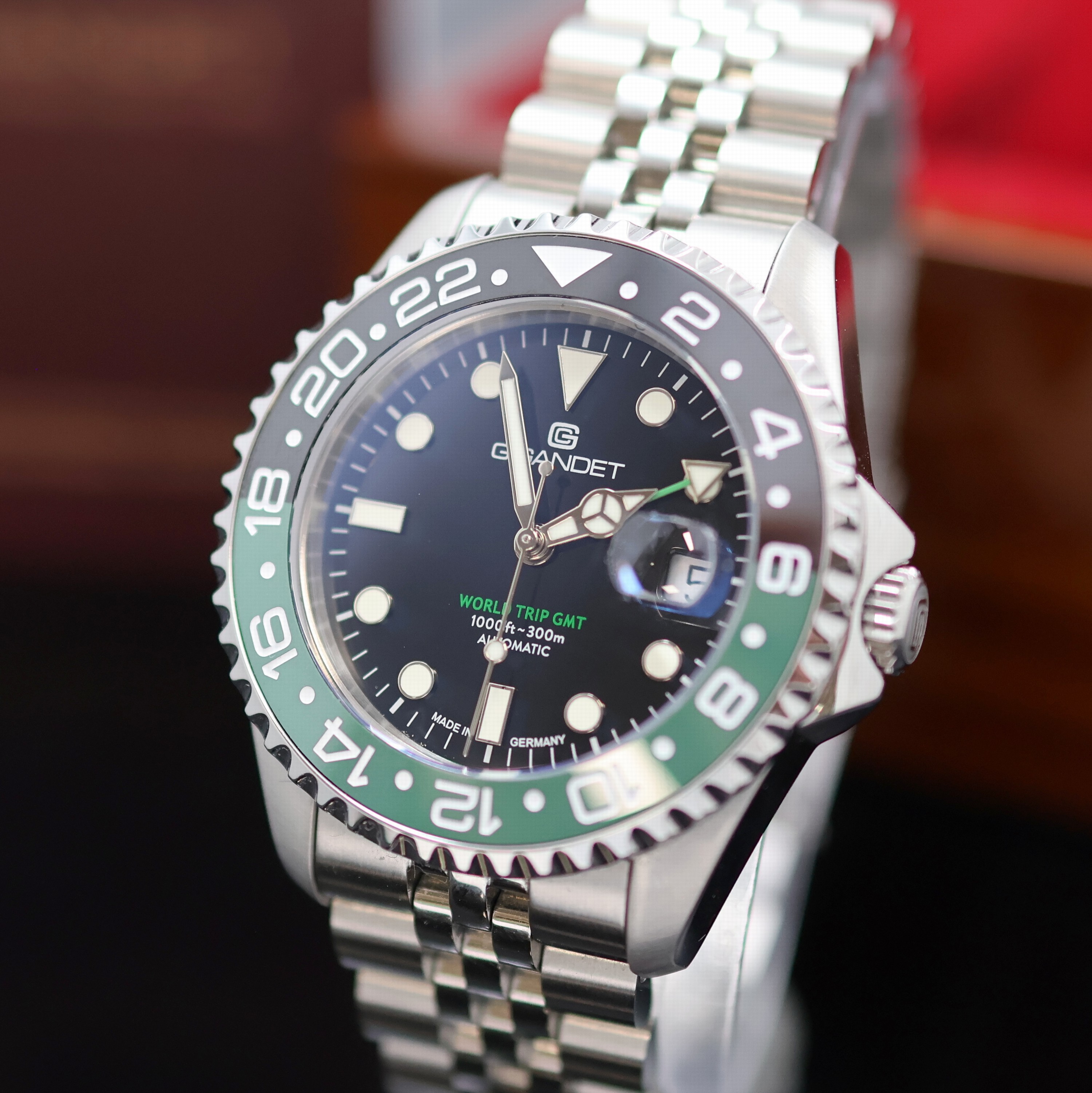 Detail b: GIGANDET World Trip GMT Herrenarmbanduhr Referenz G1000-010M-C, Deutschland verk. lt. beil. Pap. 02/2025, Automatik, Edelstahlgeh. inkl. orig. ...