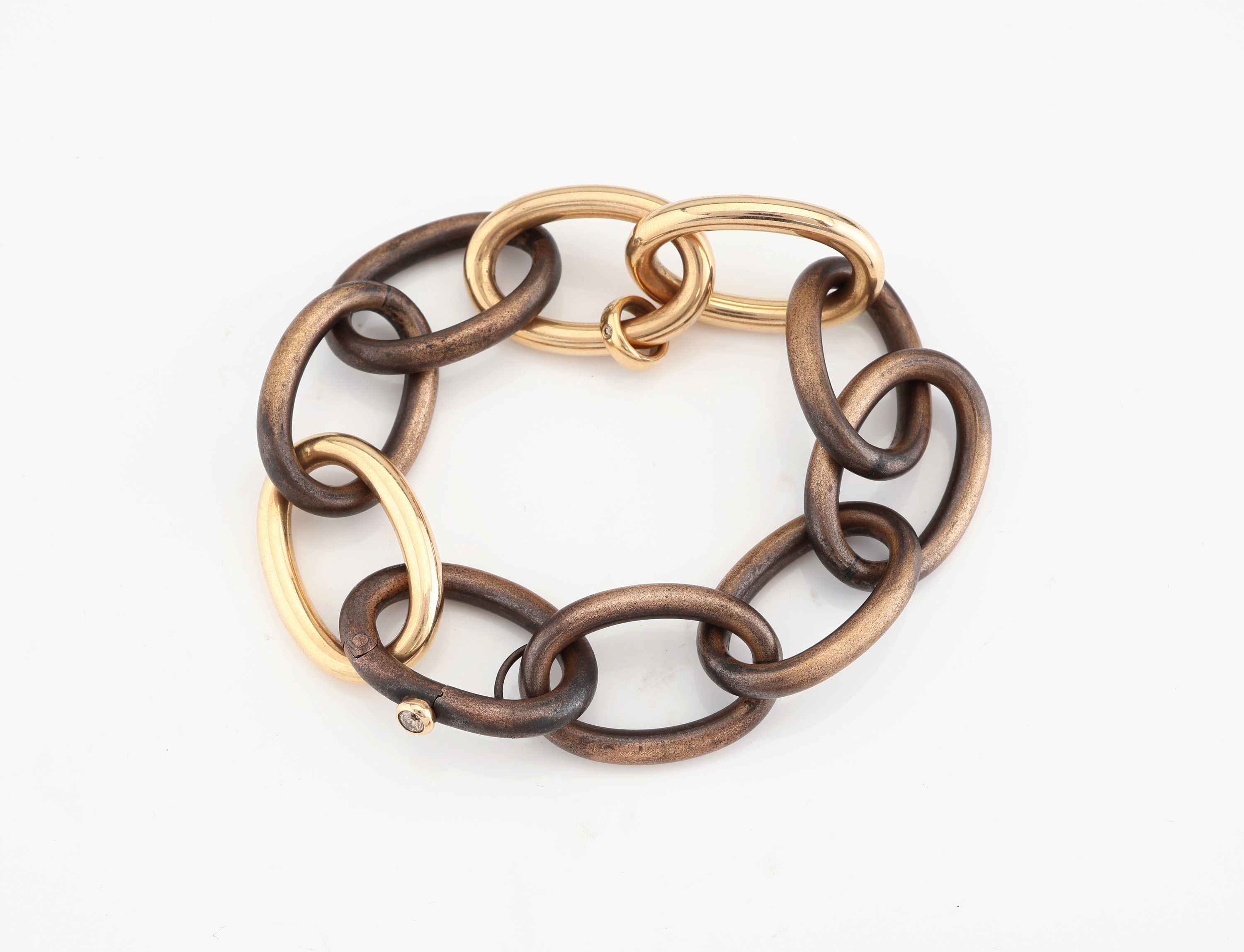 Detail b: Ausgefallenes 18 kt Gold und Bronze ISABELLE FA Armband, RG 750/000, Modell Divine 21, Glieder z.T. aus patinierter Bronze und Gold, L. ca. 23 cm, ...