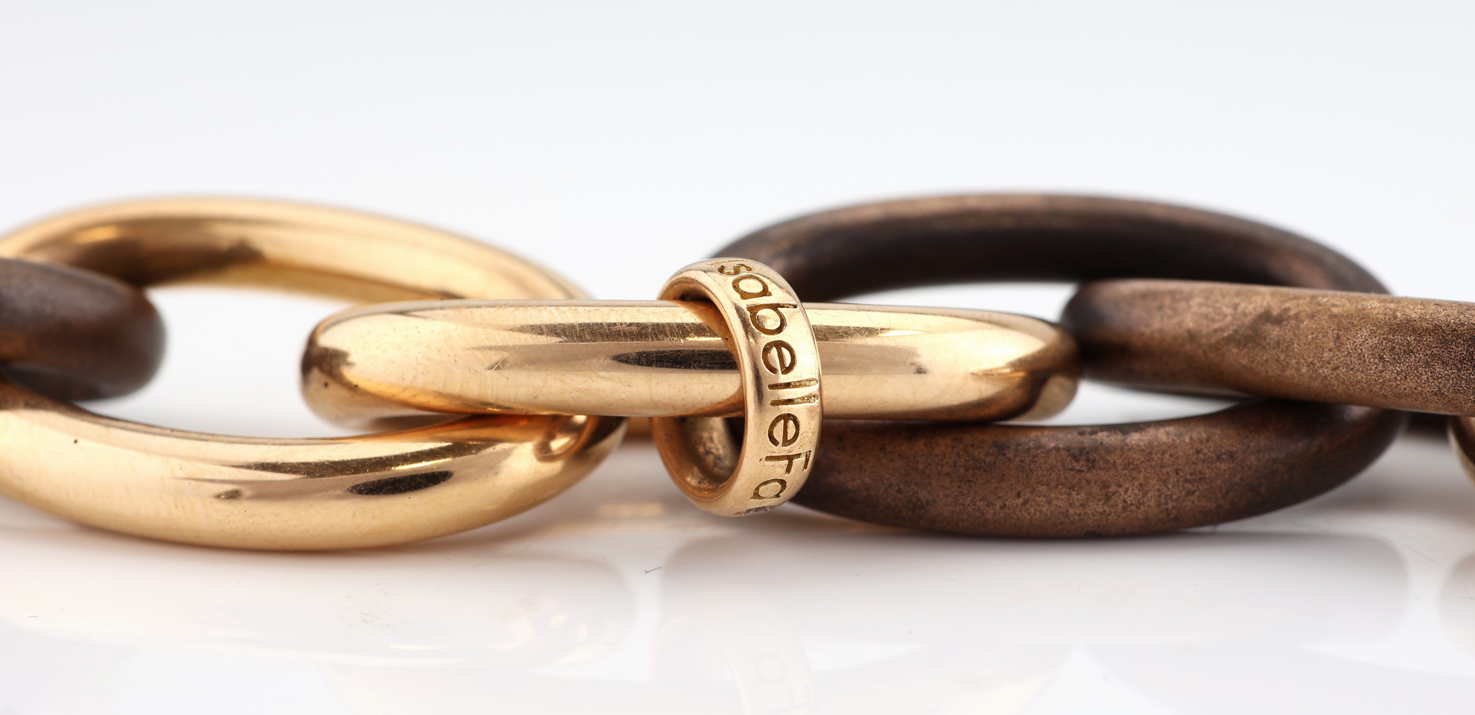 Detail d: Ausgefallenes 18 kt Gold und Bronze ISABELLE FA Armband, RG 750/000, Modell Divine 21, Glieder z.T. aus patinierter Bronze und Gold, L. ca. 23 cm, ...