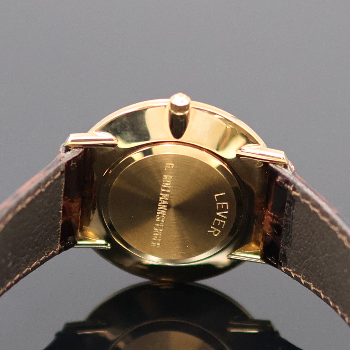 Detail a: ETERNA Herrenarmbanduhr in GG 585/000 Referenz 4000.65, 3-teil. Geh. inkl. orig. Lederband m. verg. orig. Dornschl., Glasrand und Boden m. ...