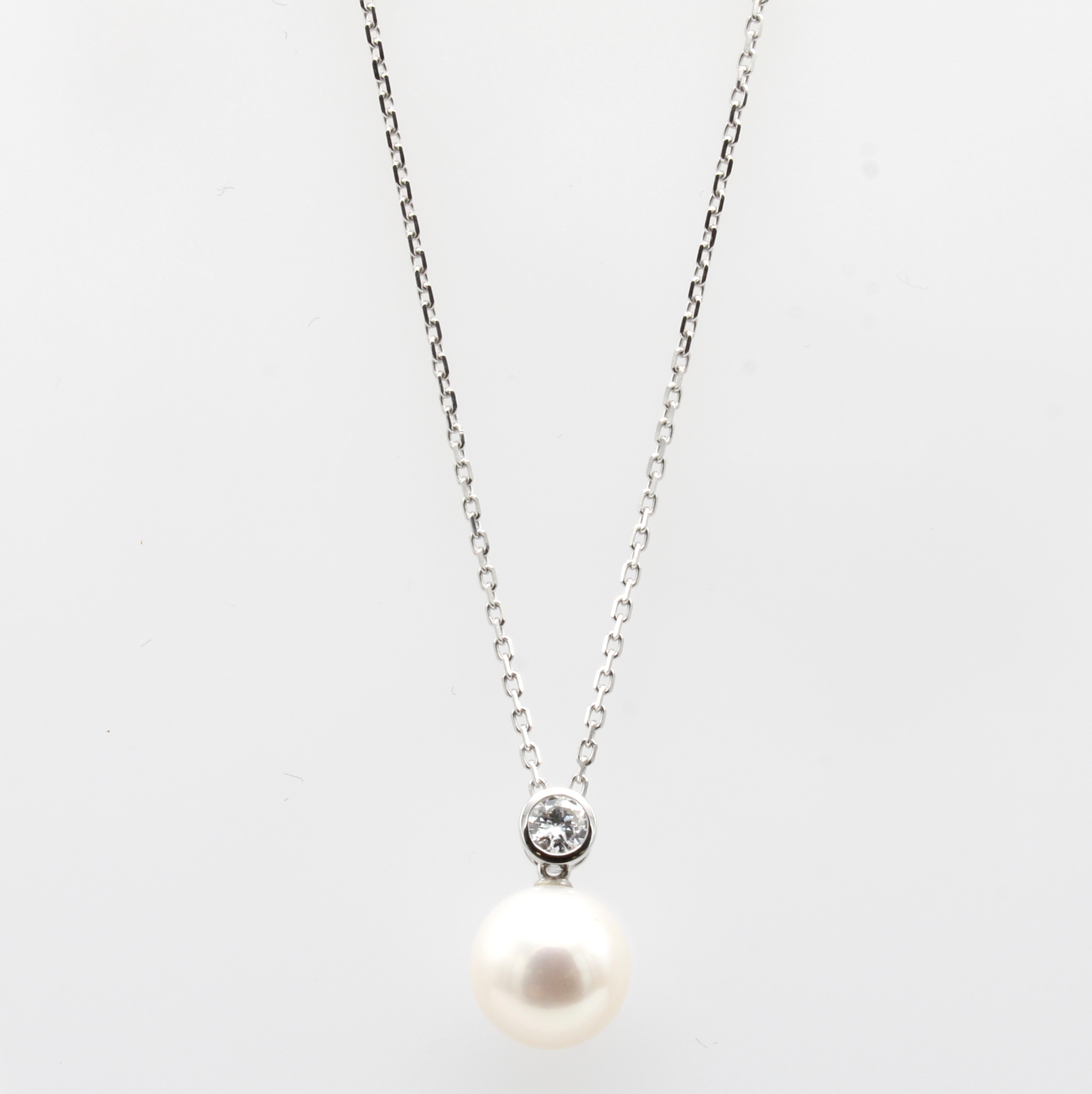 Image 27052627 - Anhänger mit Brillant und Süßwasserzuchtperle an Kette, WG 750/000, Brill. ca. 0.18 ...