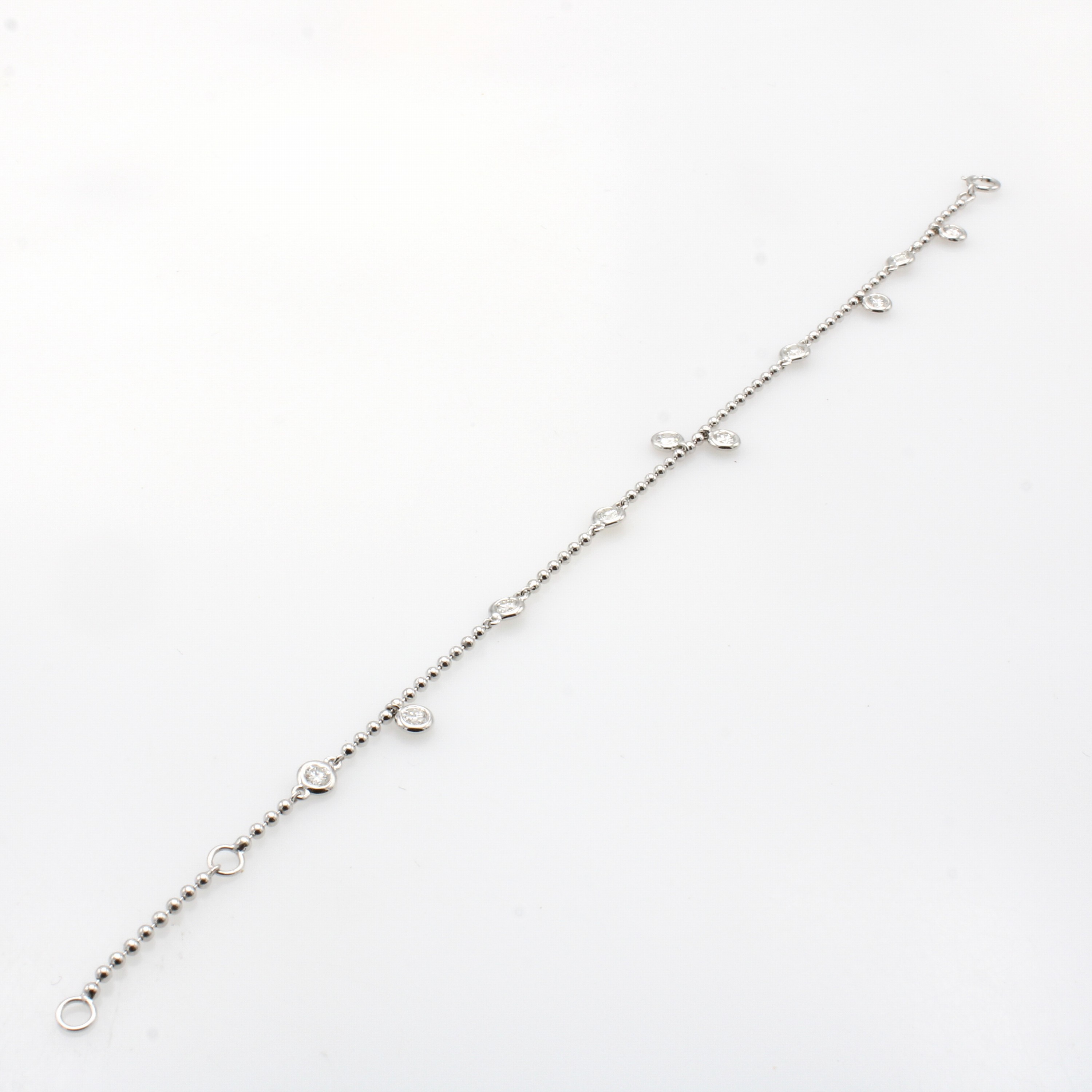 Image 27052628 - Armband mit Brillanten, WG 750/000, 10 Brill. z.T. in Kette integriert zus. ca. 0.67 ct ...